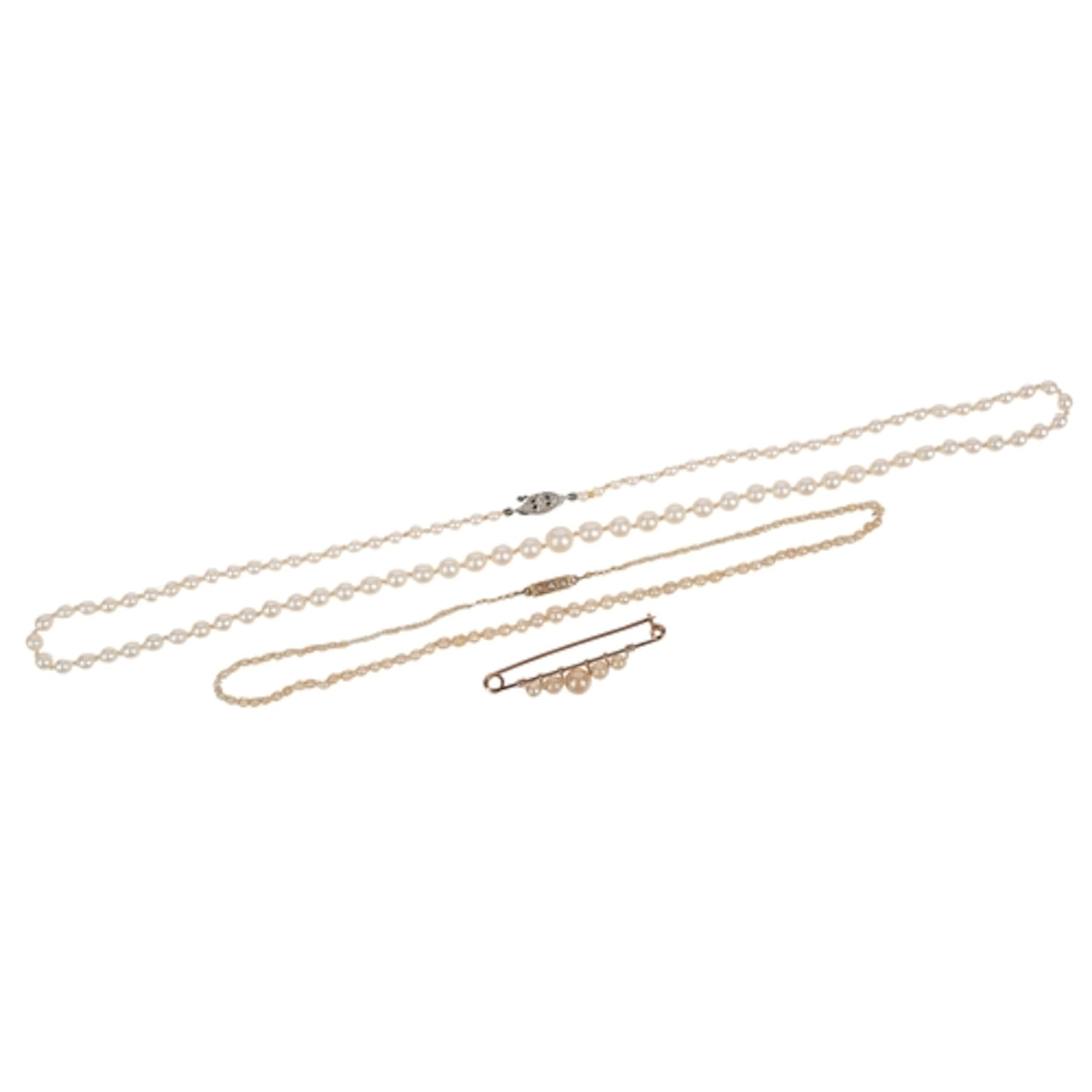 Two cultured pearl necklaces and a brooch, comprising: a sin...