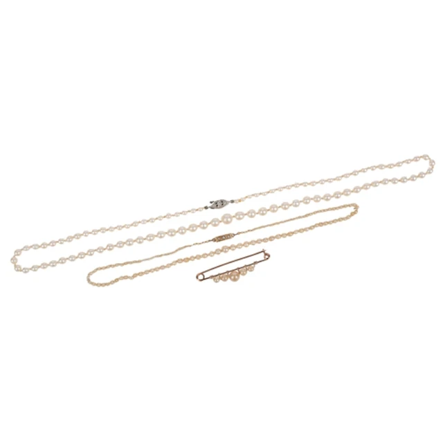 Two cultured pearl necklaces and a brooch, comprising: a sin...