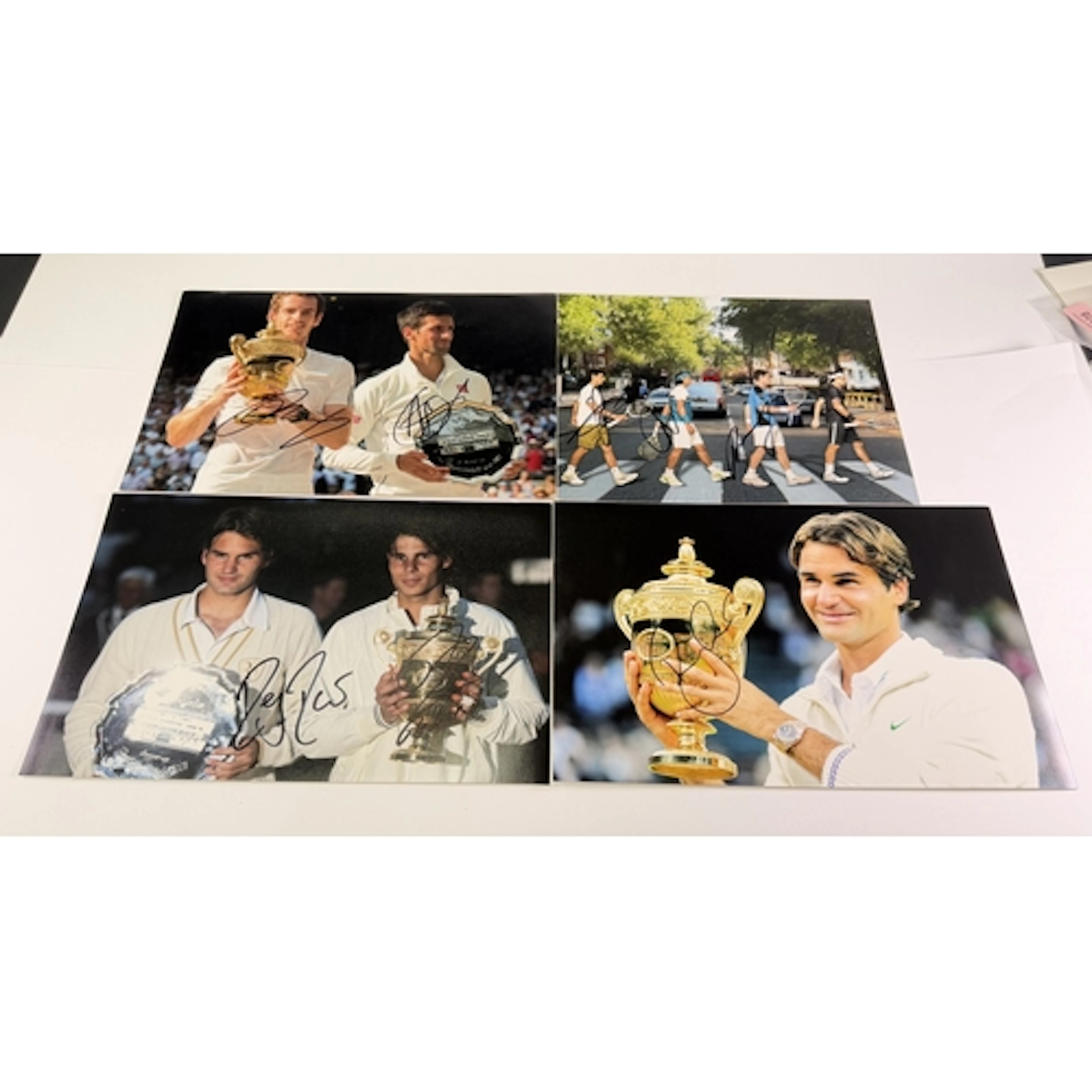 A group of Studio publicity photographs with signatures of N...
