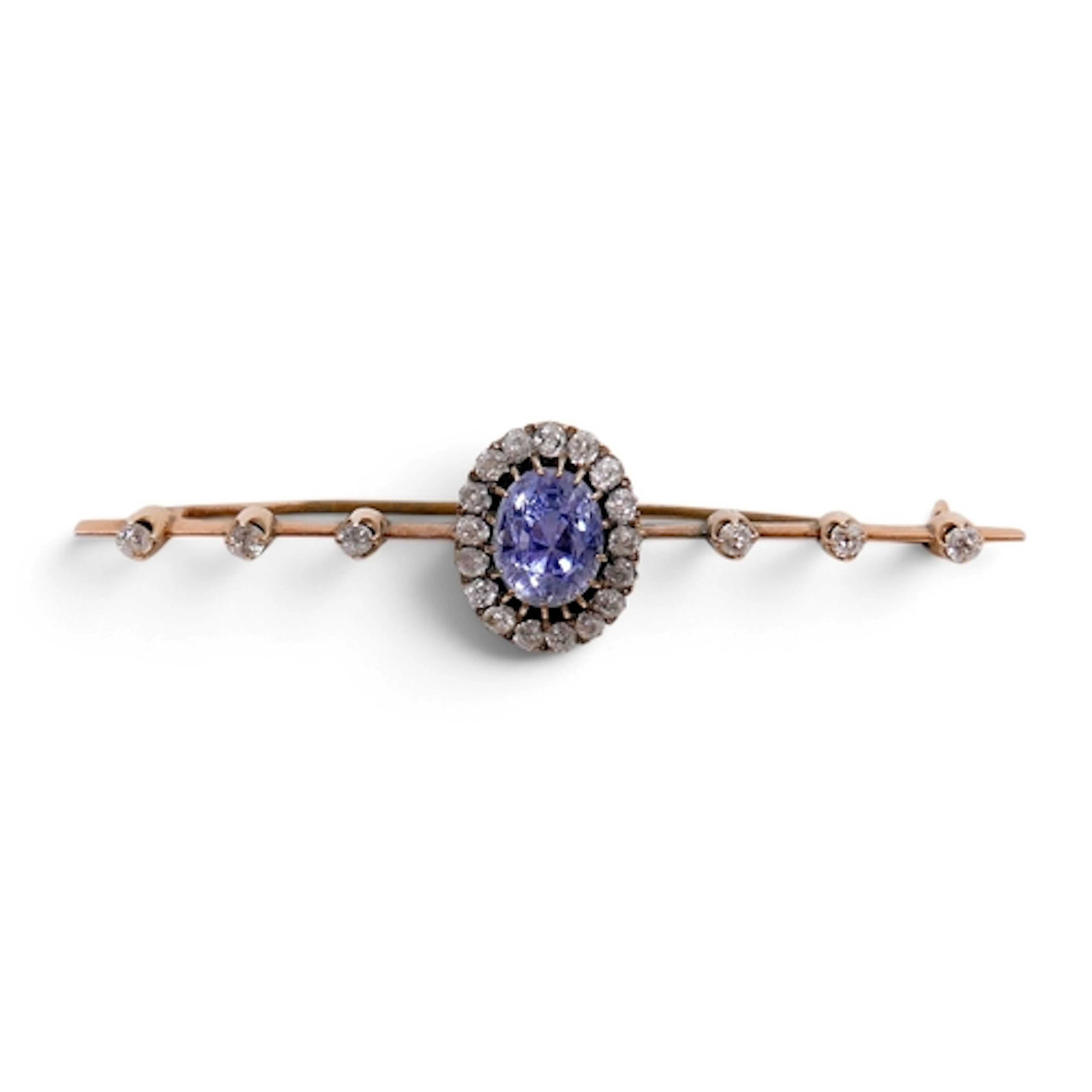 AN EDWARDIAN DIAMOND SET BAR BROOCH. with central deep oval ...