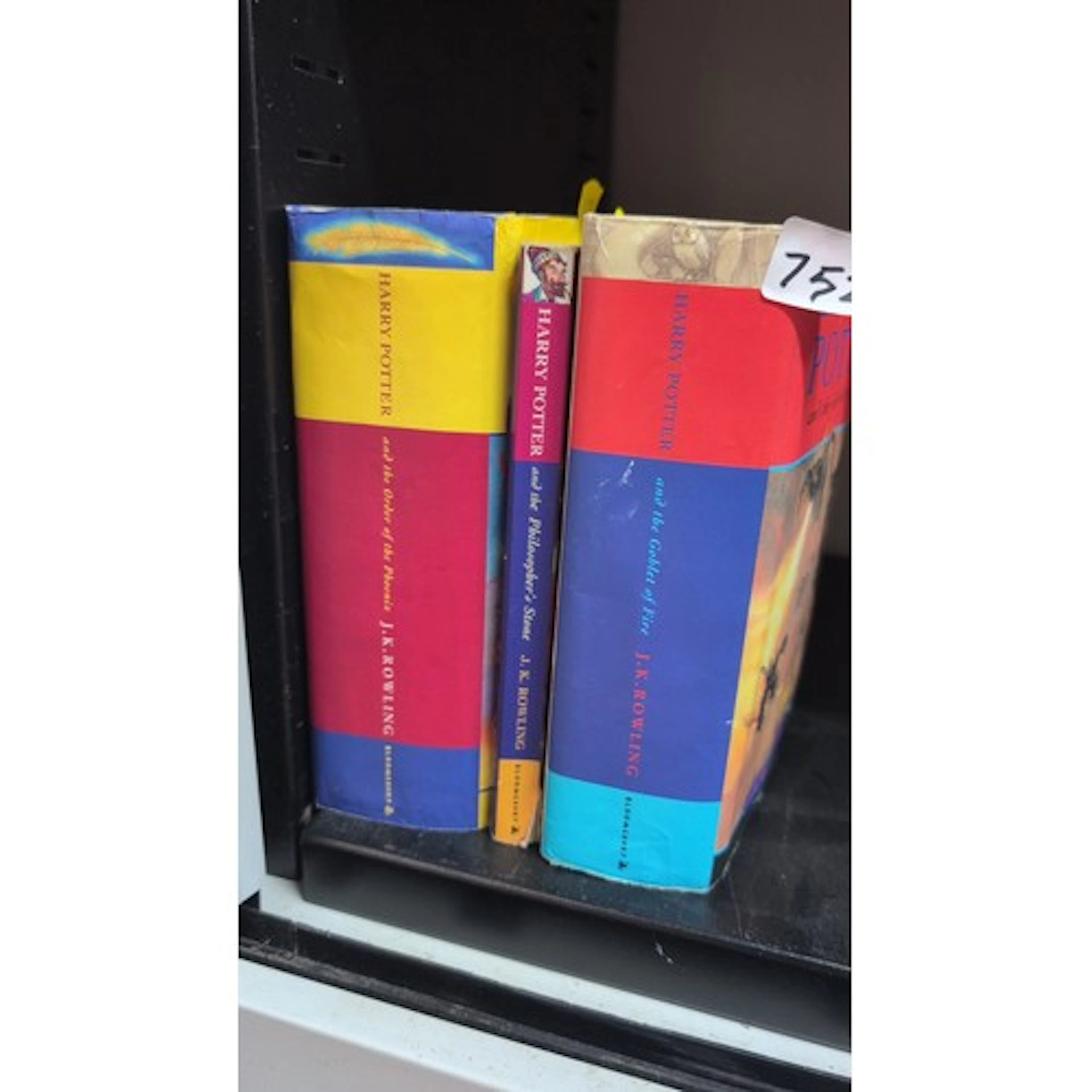 Three J.K. Rowling Harry Potter hardback volumes, Bloomsbury...