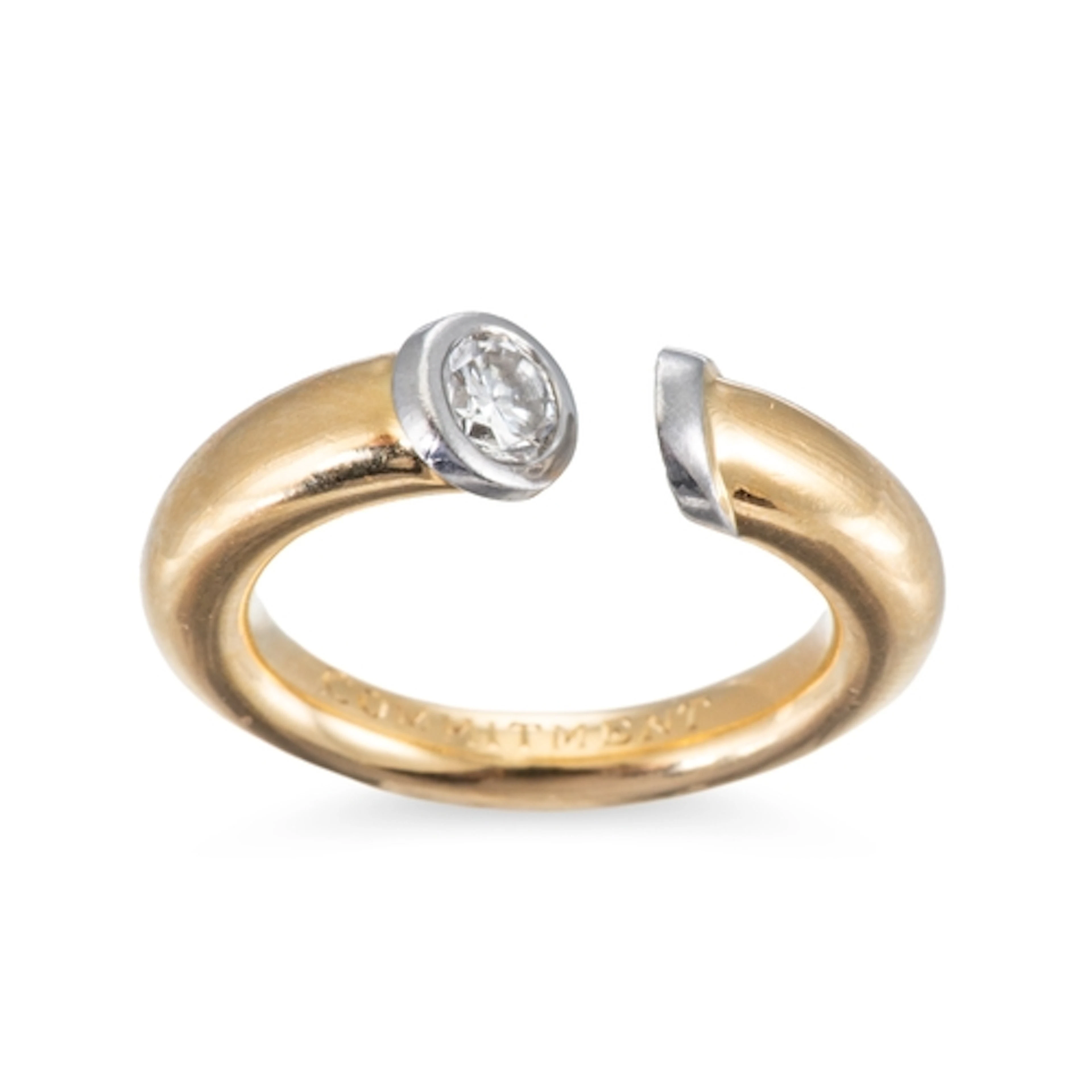 A DIAMOND SET BAND RING, the round brilliant cut diamond mou...