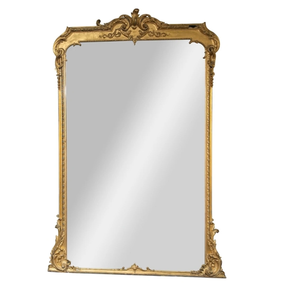 A substantial giltwood and composition framed rectangular wa...