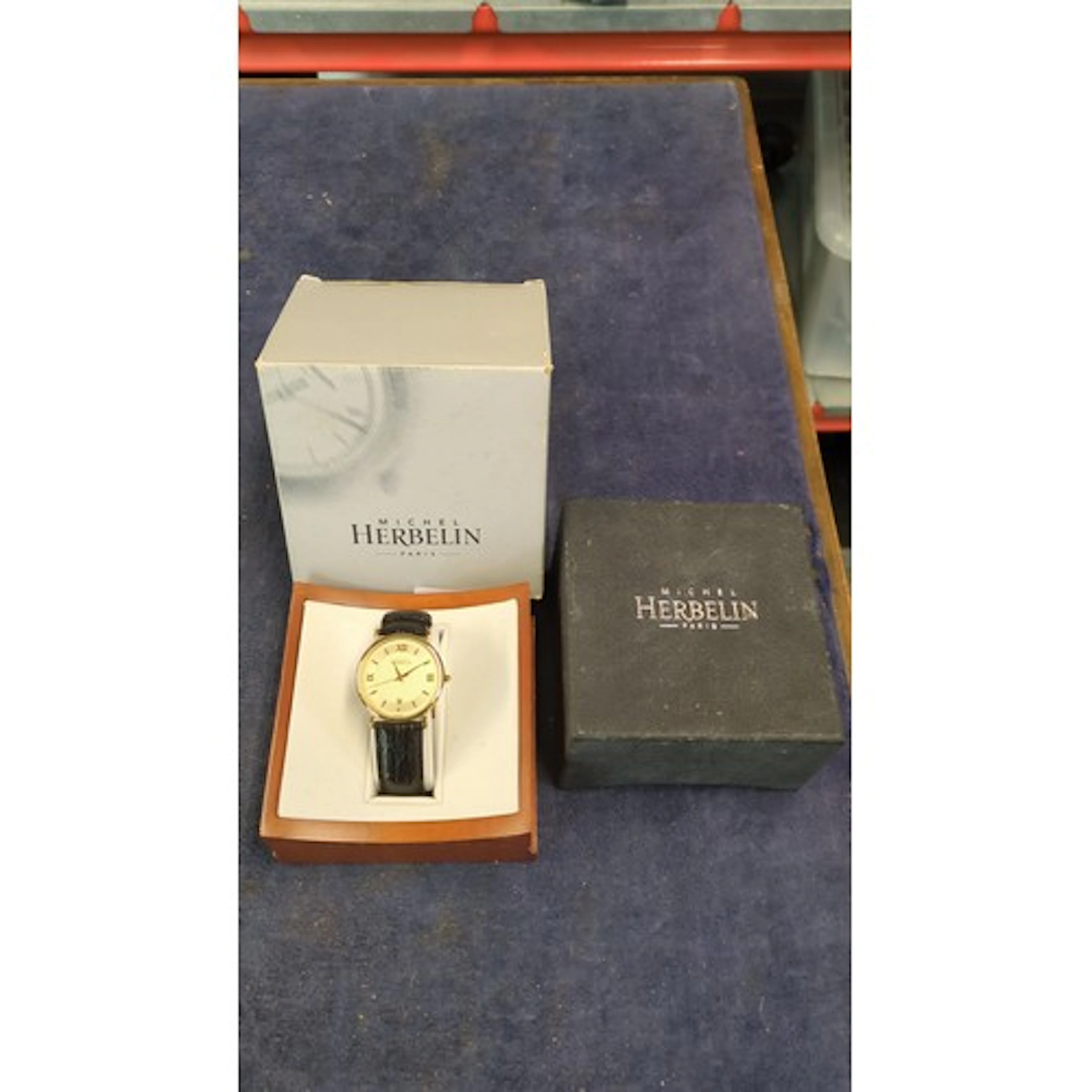 Michel Herbelin Paris wristwatch with round gilt-tone case, ...