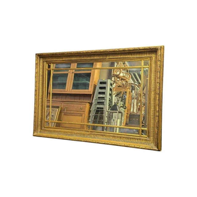 A 19th century Victorian overmantel gilt mirror. The mirror ...