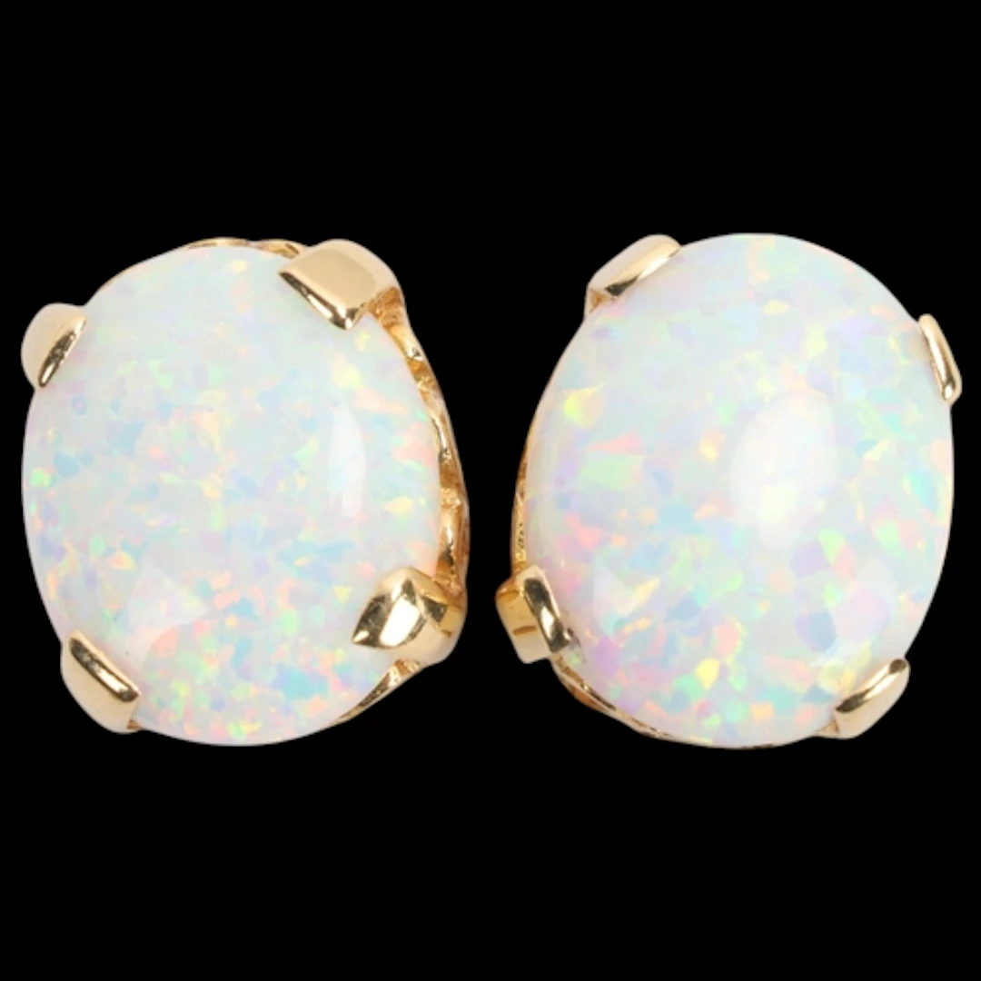 A pair of 14ct gold synthetic opal stud earrings, claw set w...