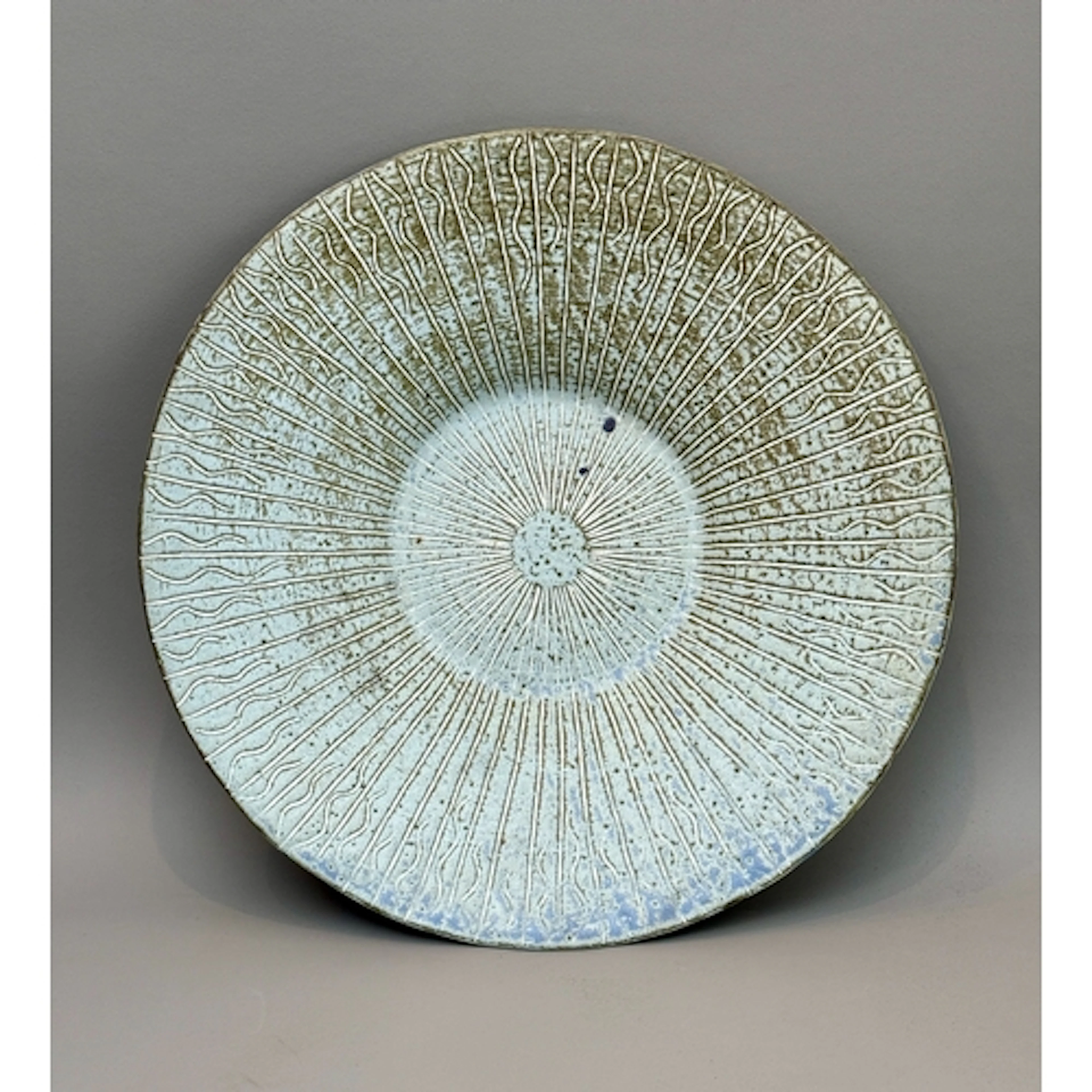 A stoneware studio pottery charger - by Diane M Ferrari, Gle...