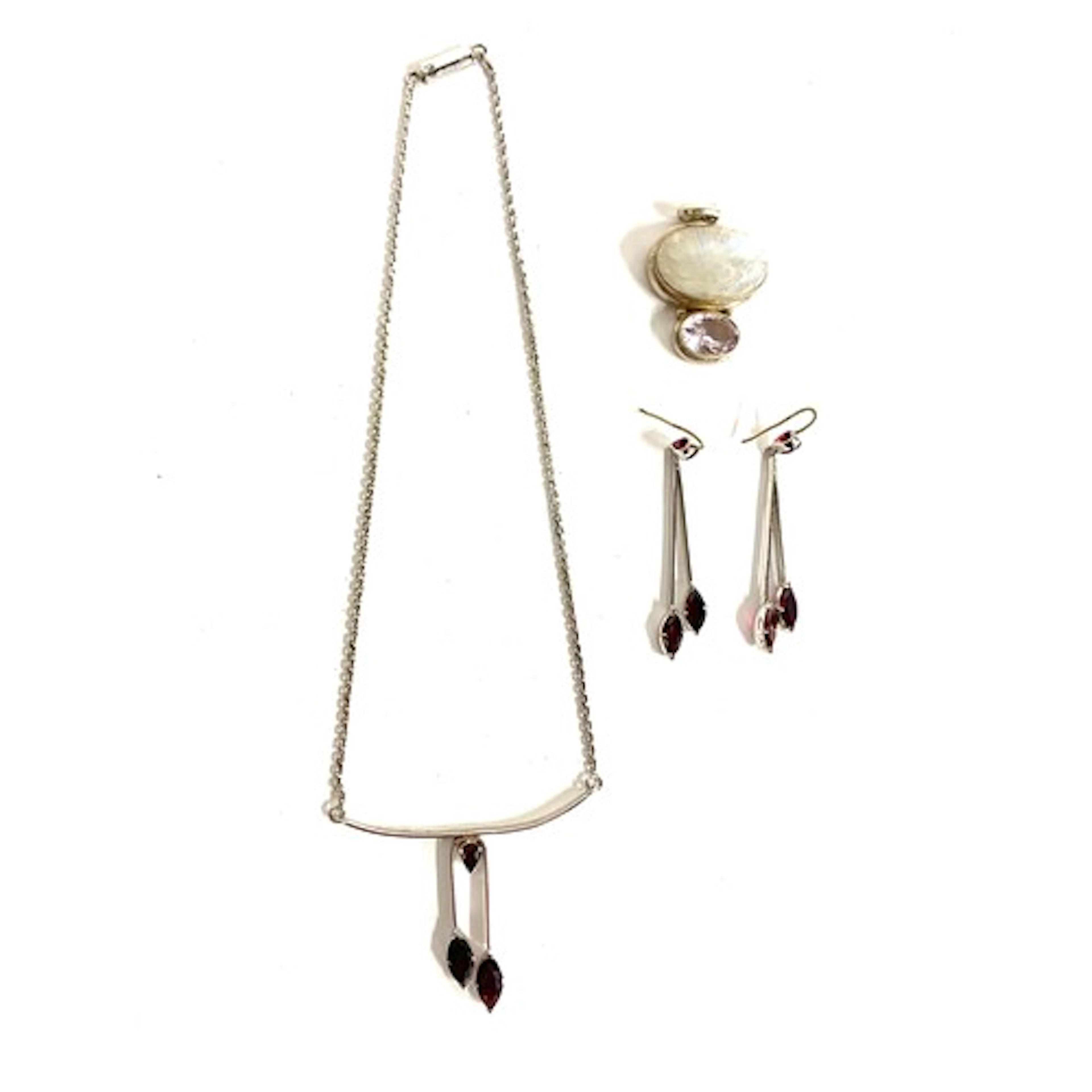 A 925 silver mounted moonstone and quartz pendant; together ...