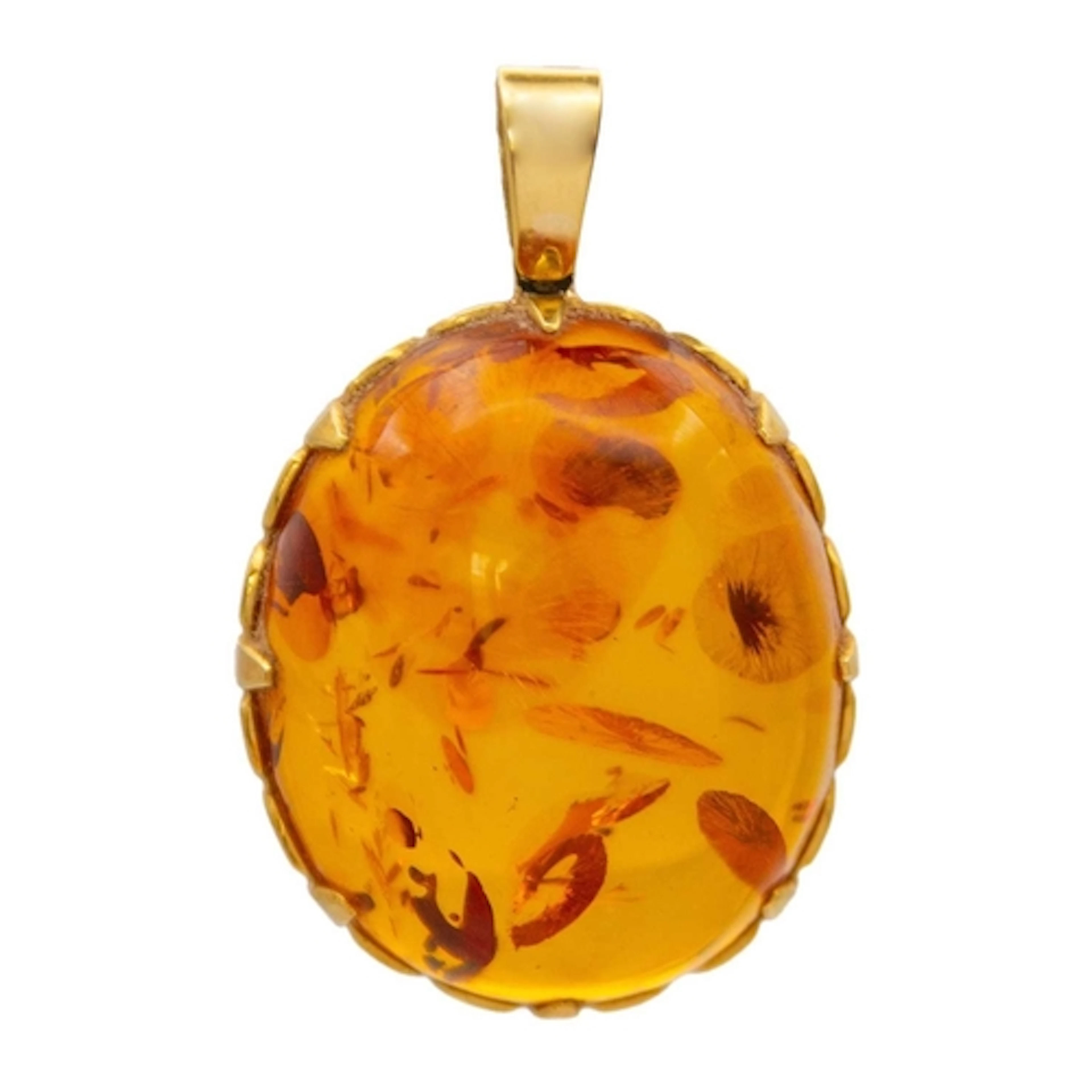 An 18k mounted oval cabochon amber pendant. The oval cabocho...