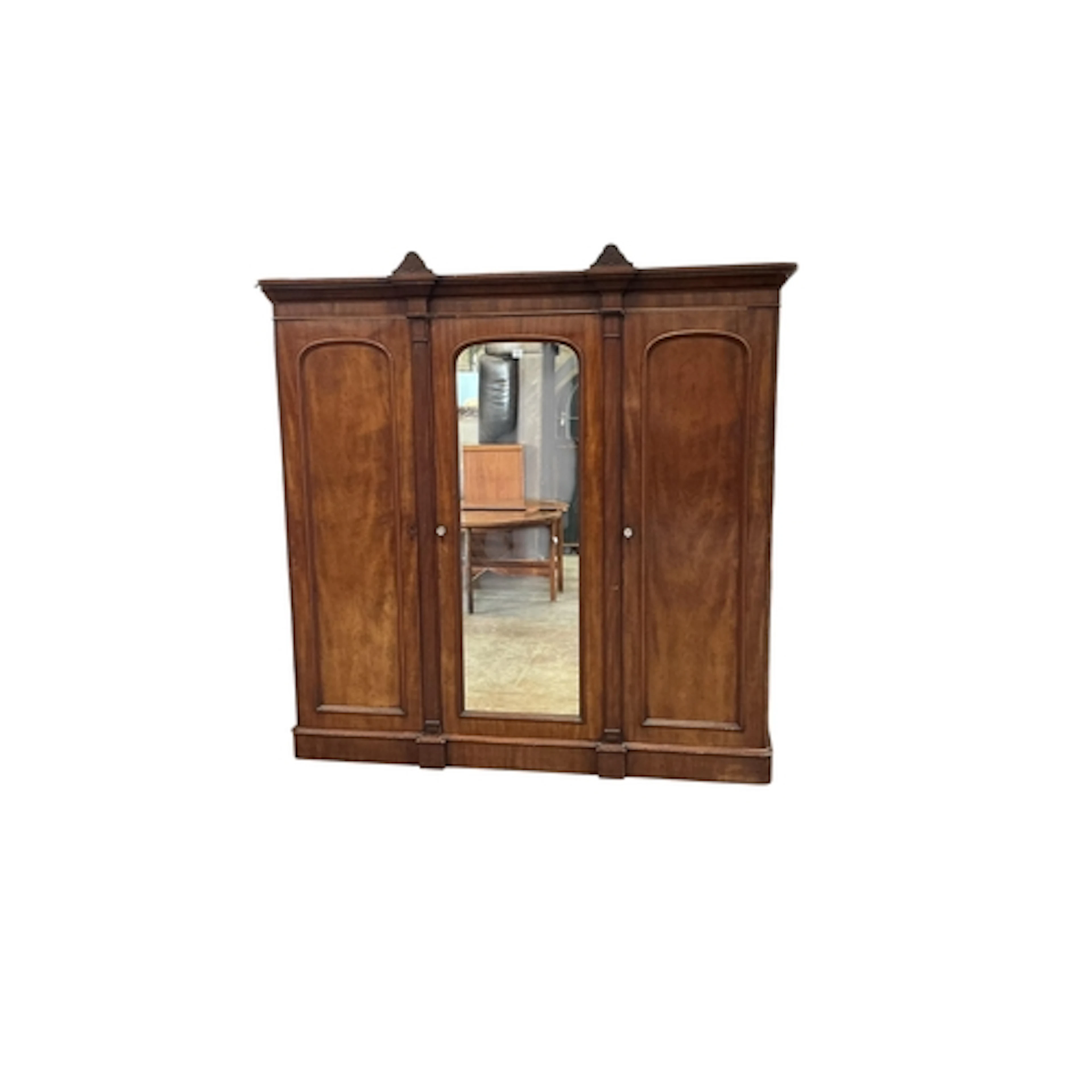 A Victorian mahogany triple wardrobe, width 254cm, depth 60c...