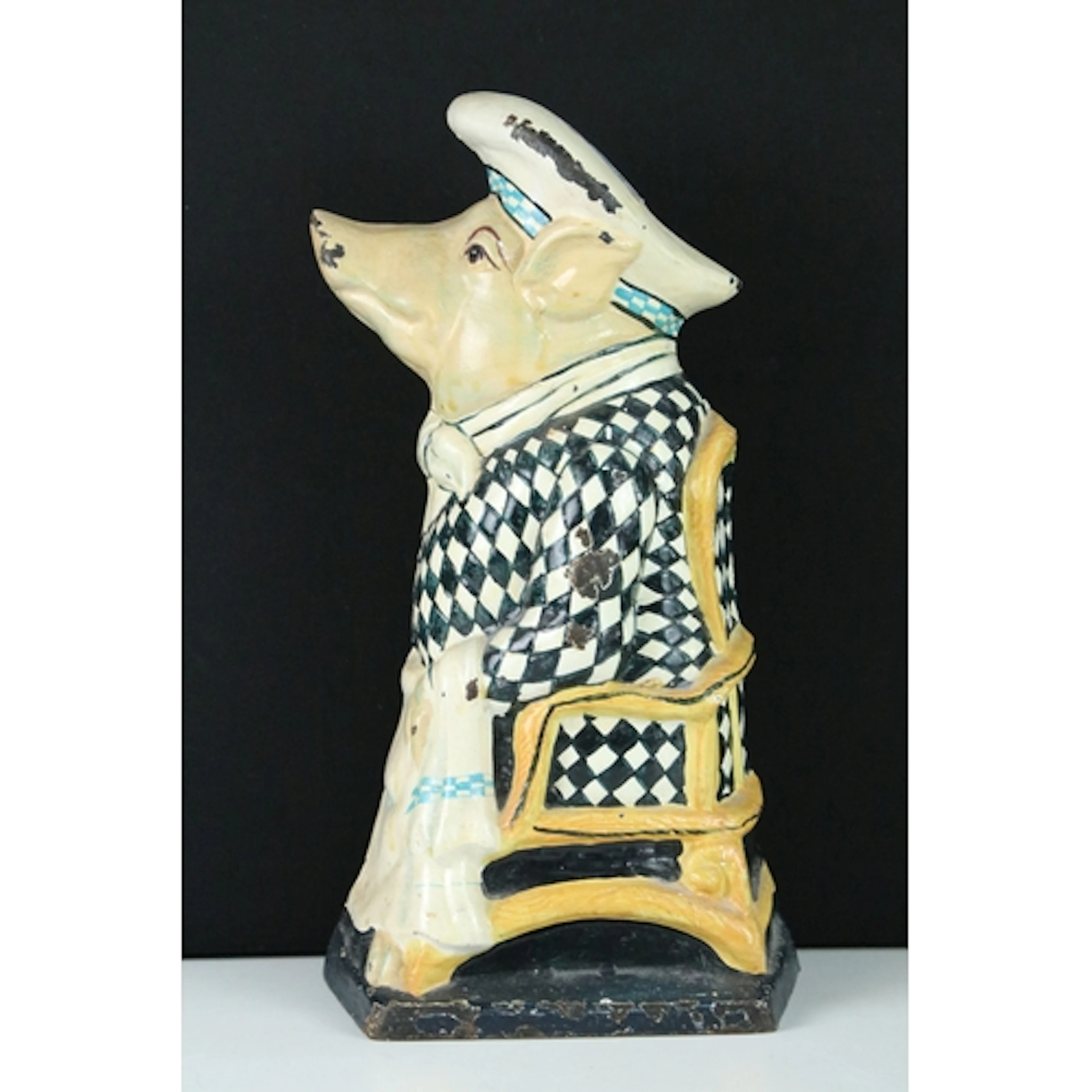 Painted cast iron shop display /doorstop model of a seated p...