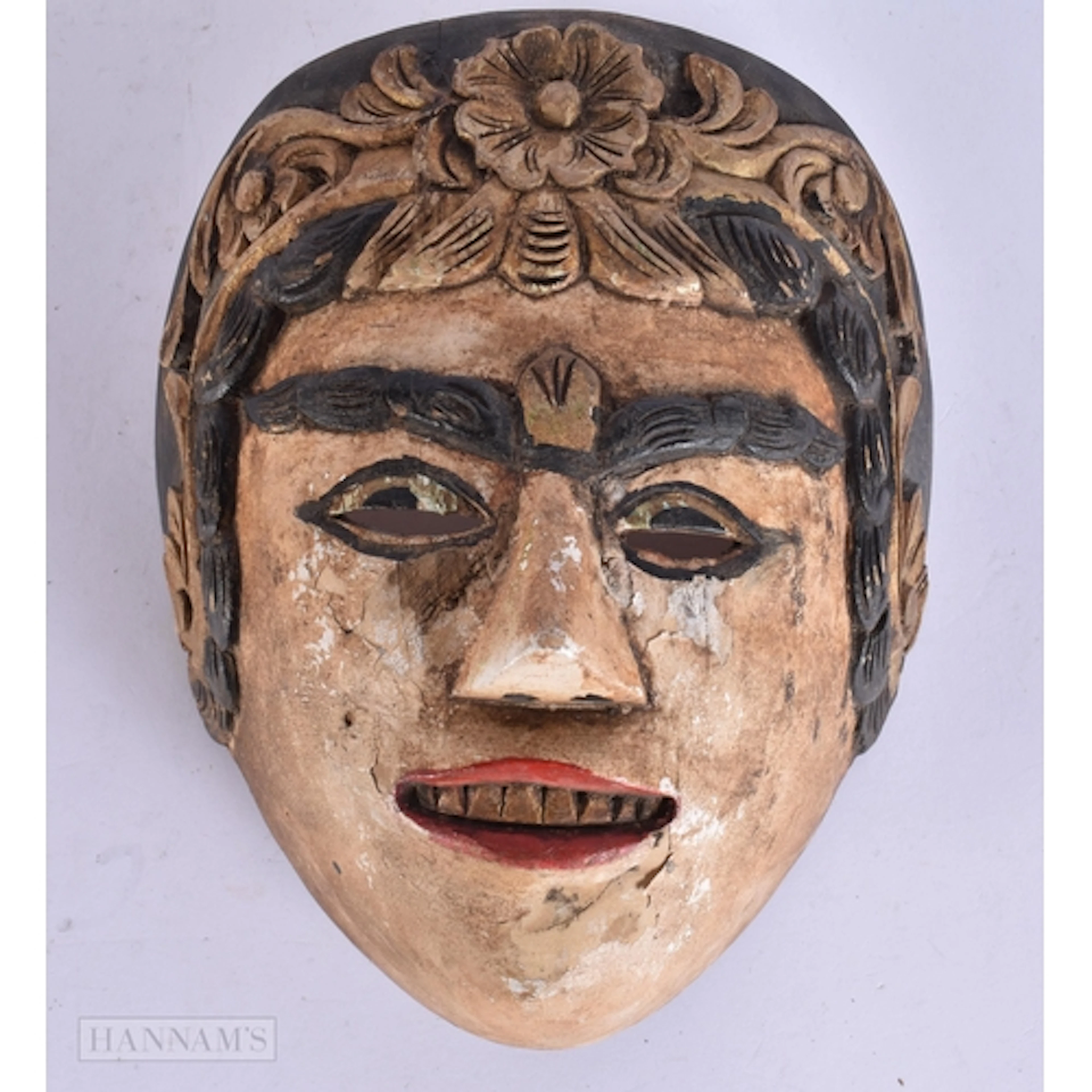 A JAVANESE PAINTED WOOD MASK. 18 cm x 14 cm.