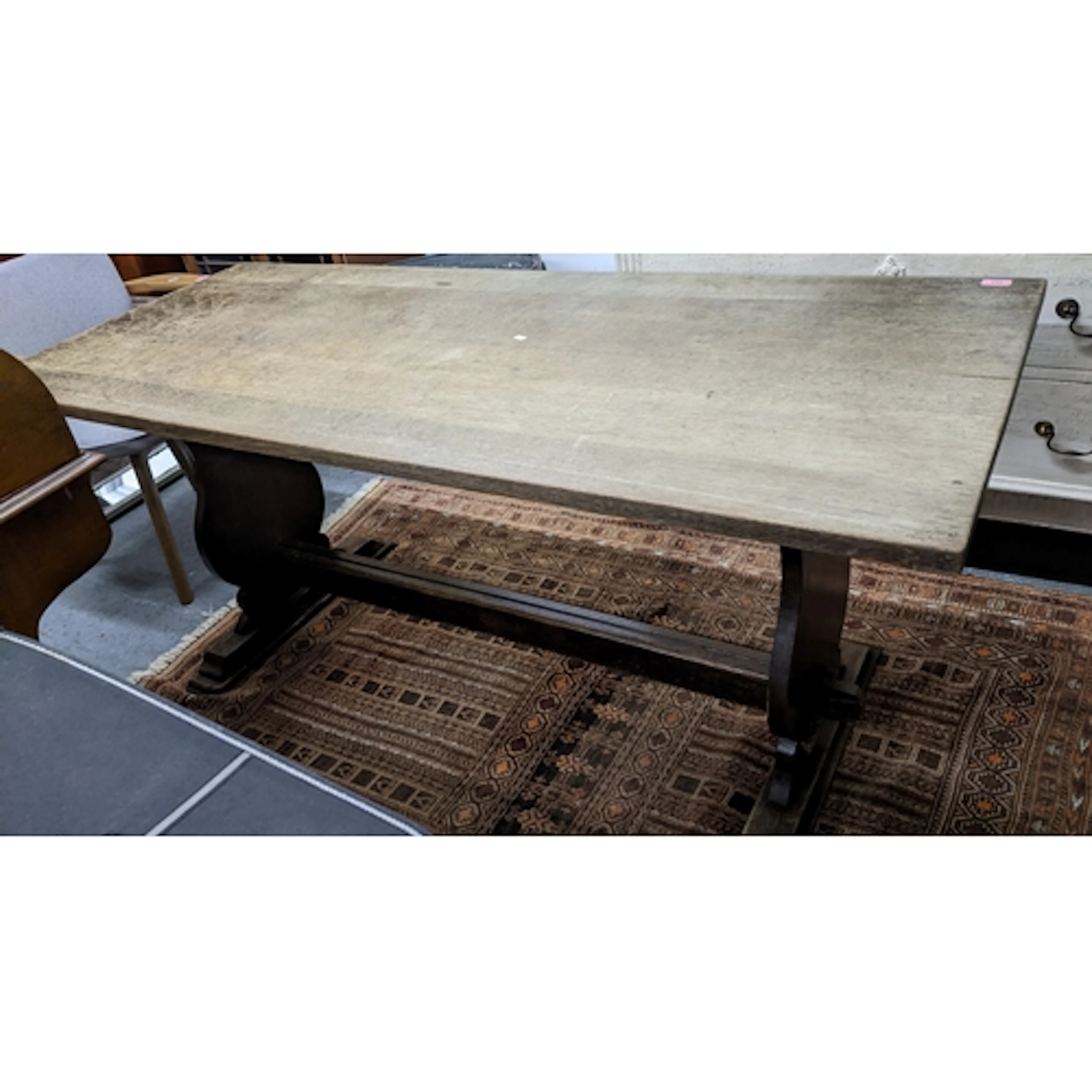 An oak trestle end dining table, 73.5 x 168 x 71cms. Locati...