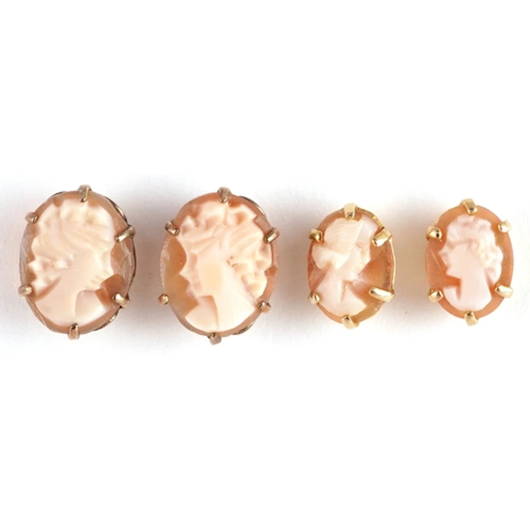 Two pairs of 9ct gold cameo shell stud earrings carved with ...