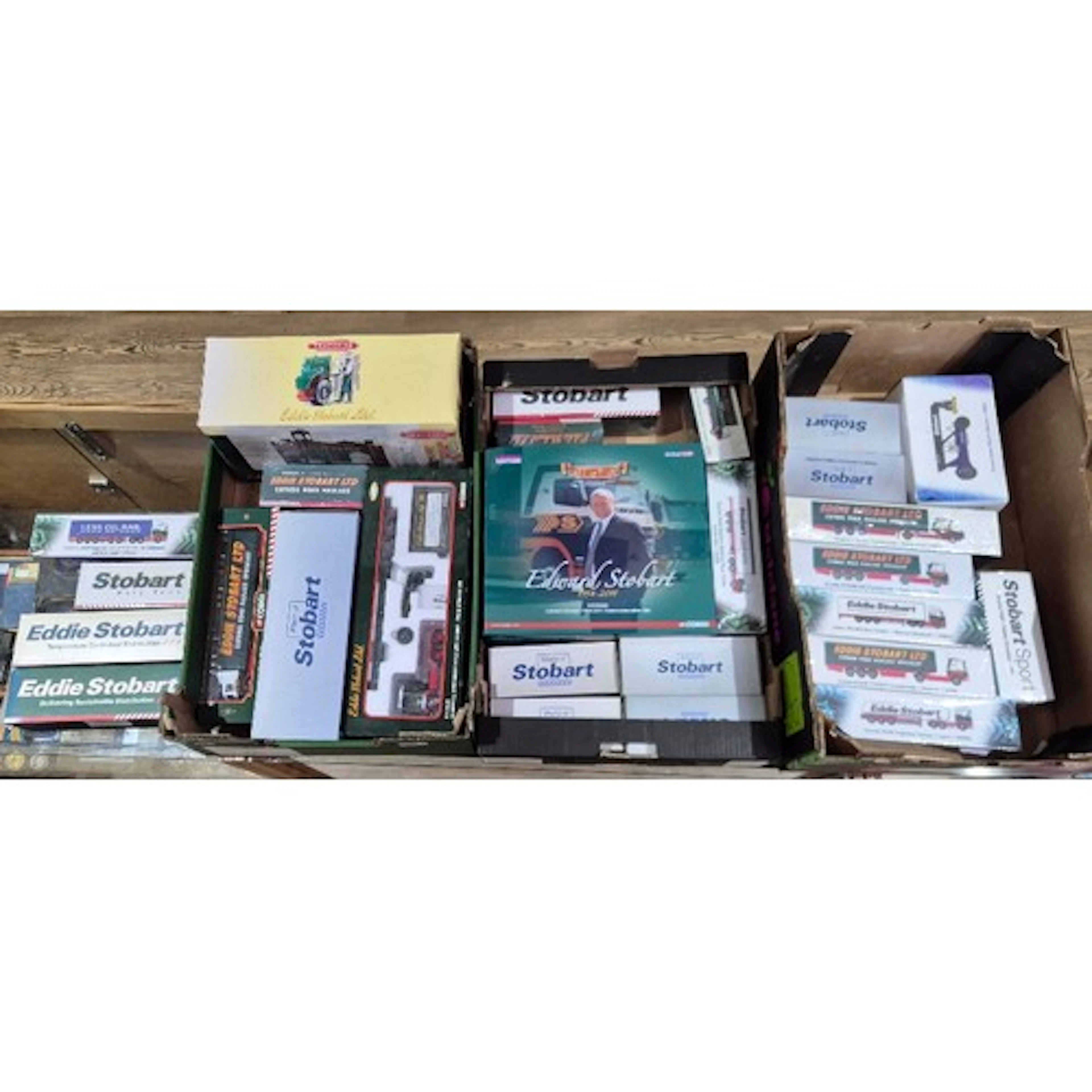 Three boxes of assorted Eddie Stobart diecast vehicles to in...