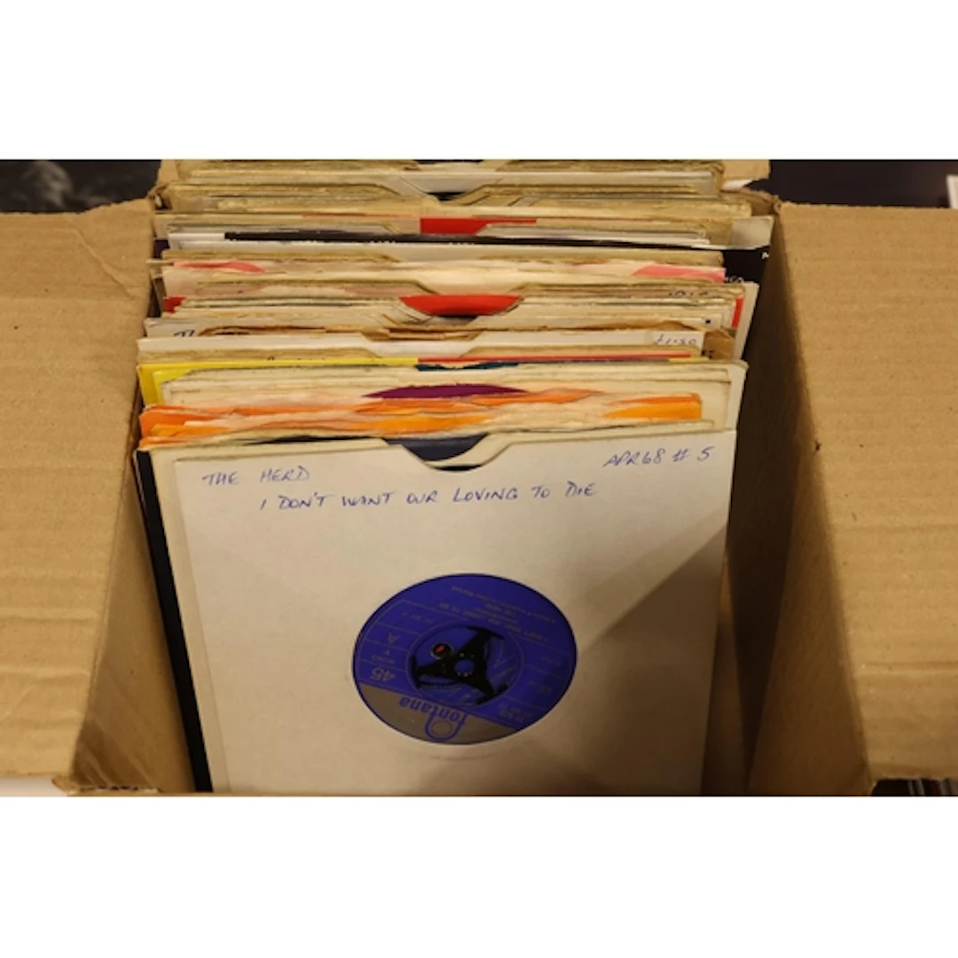 Box of 7'' singles to include The Herd, The Bryds, Chuck Ber...