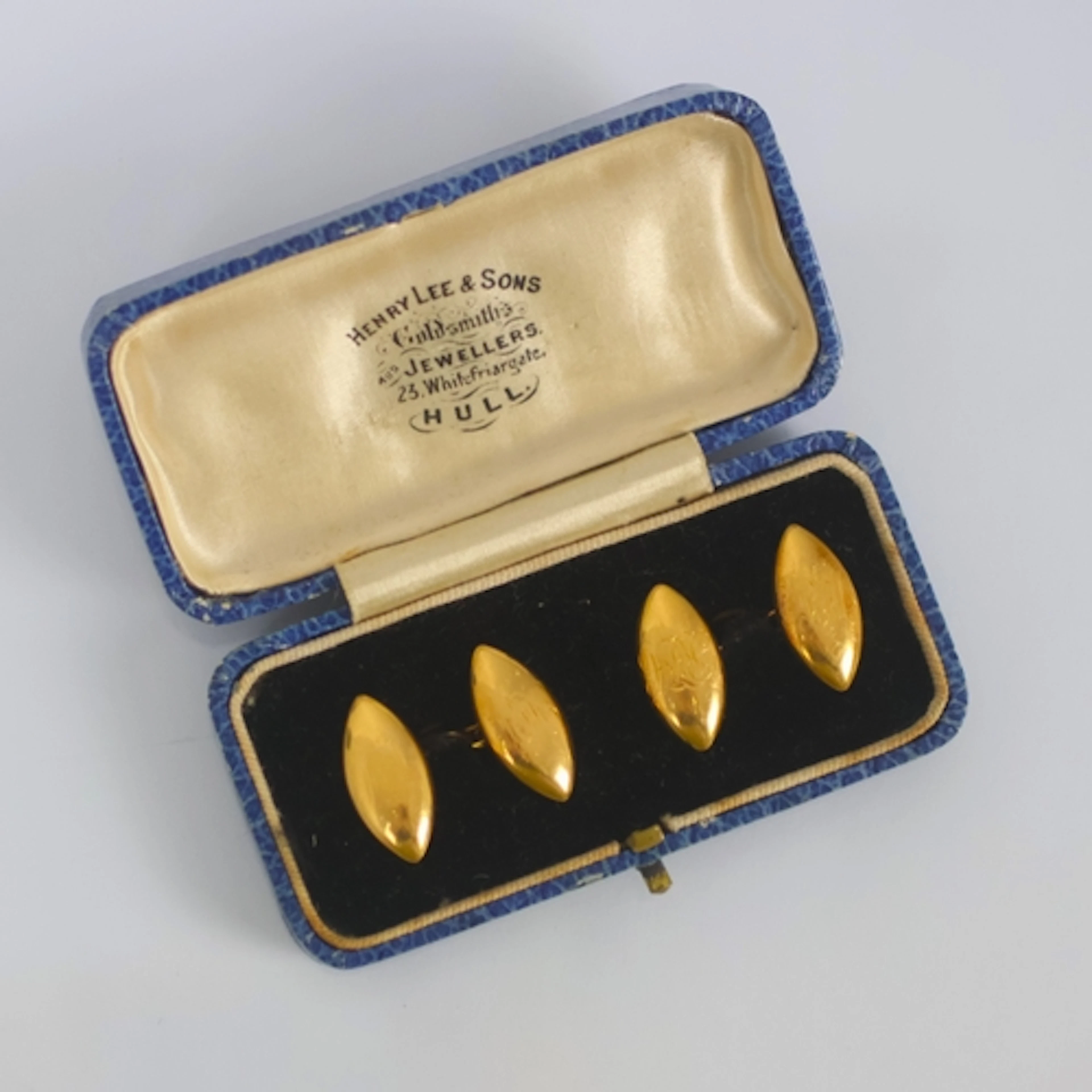 A pair of late 19th/early 20th century yellow metal cufflink...