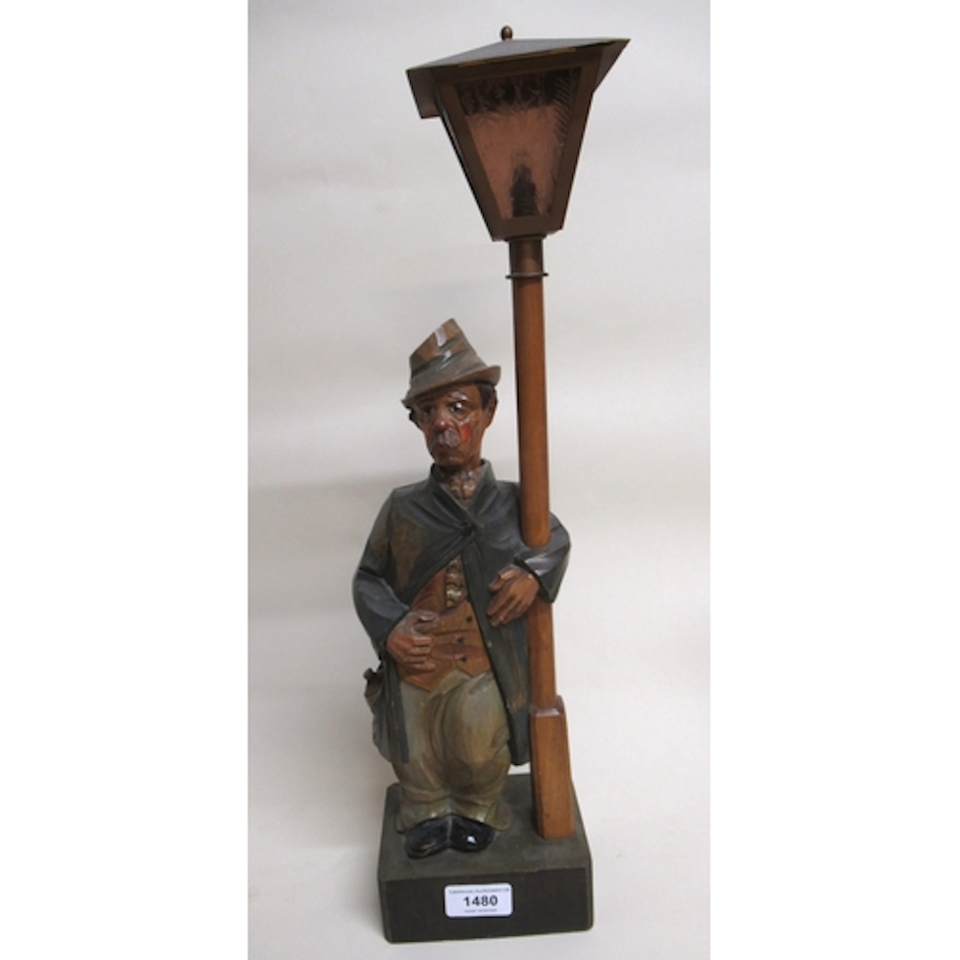 Black Forest carved painted whistling figure of a man standi...