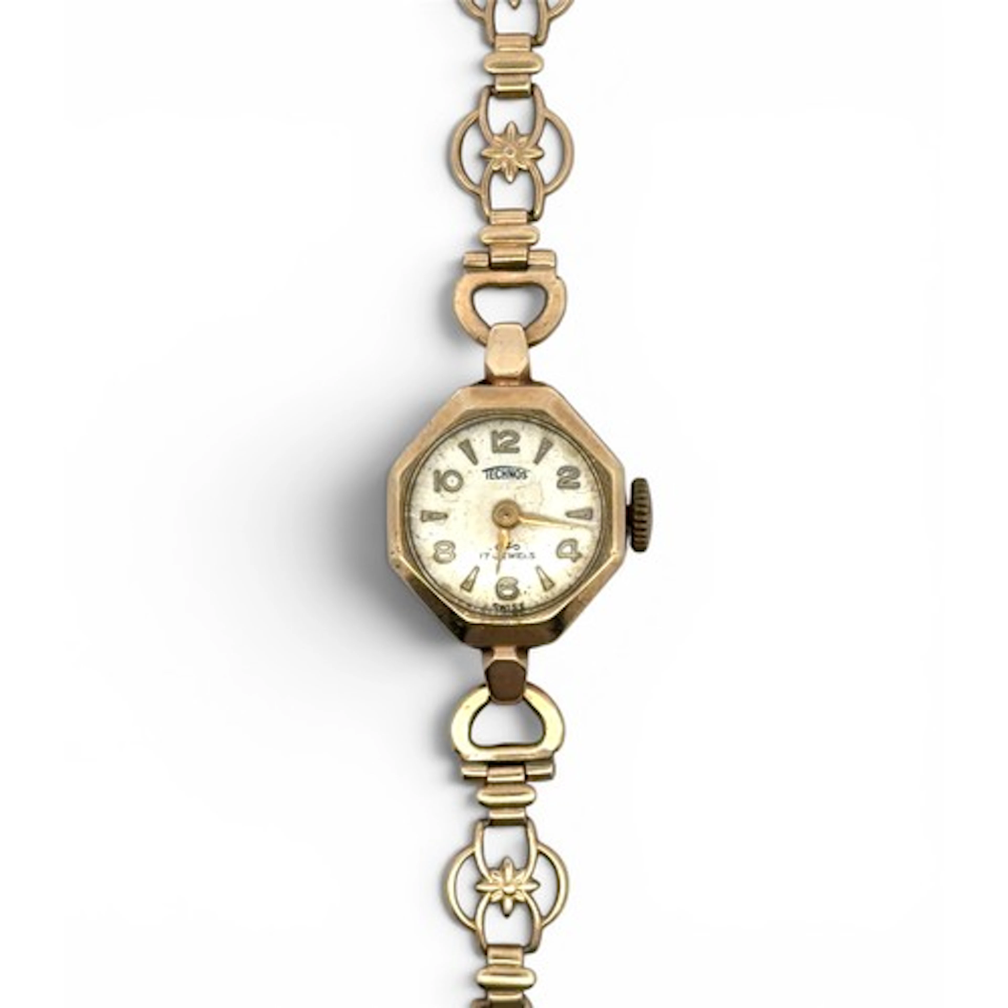 A Technos ladies gold cocktail watch with hexagonal dial, Ar...