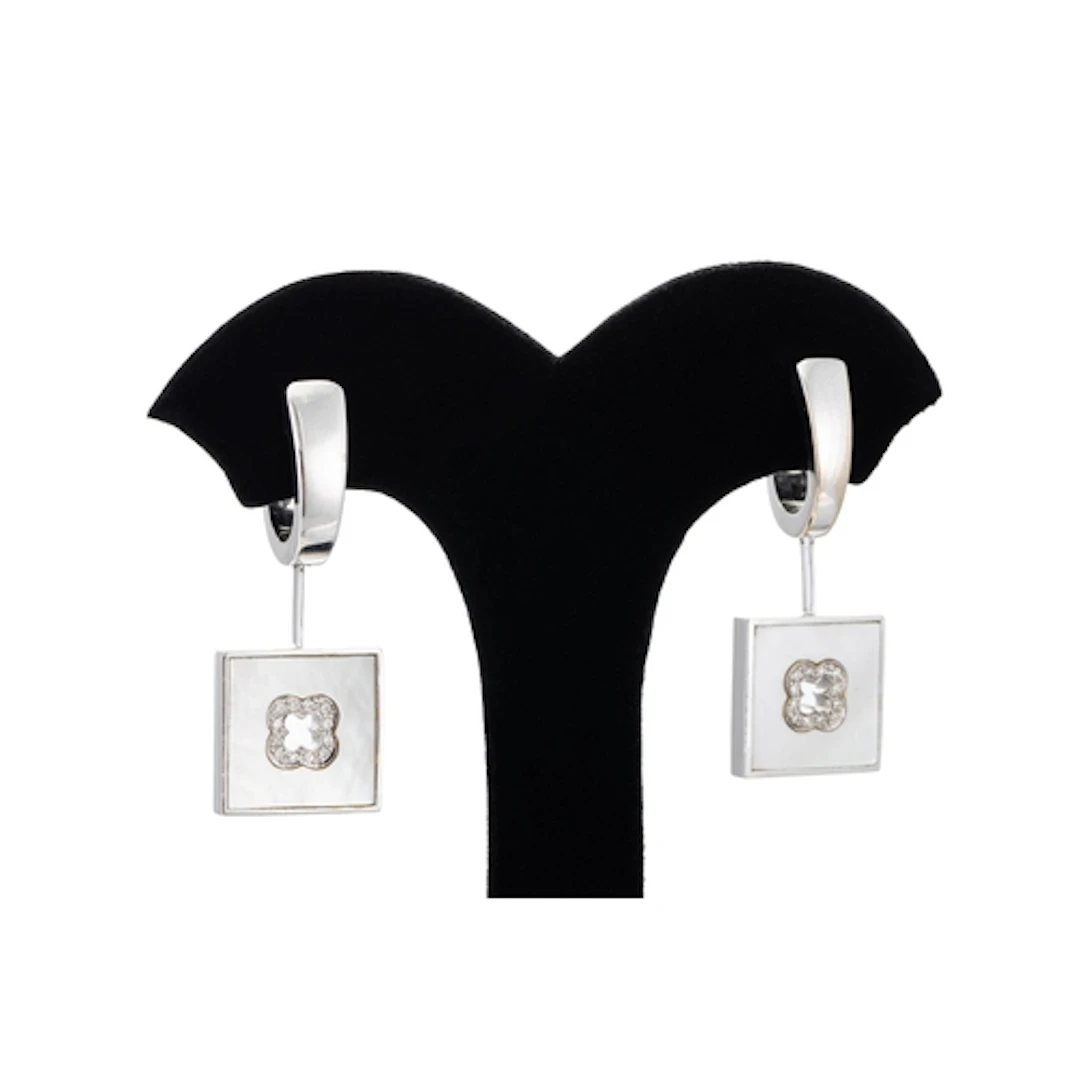 A PAIR OF MAUBOUSSIN MOTHER-OF-PEARL AND DIAMOND SQUARE EARR...