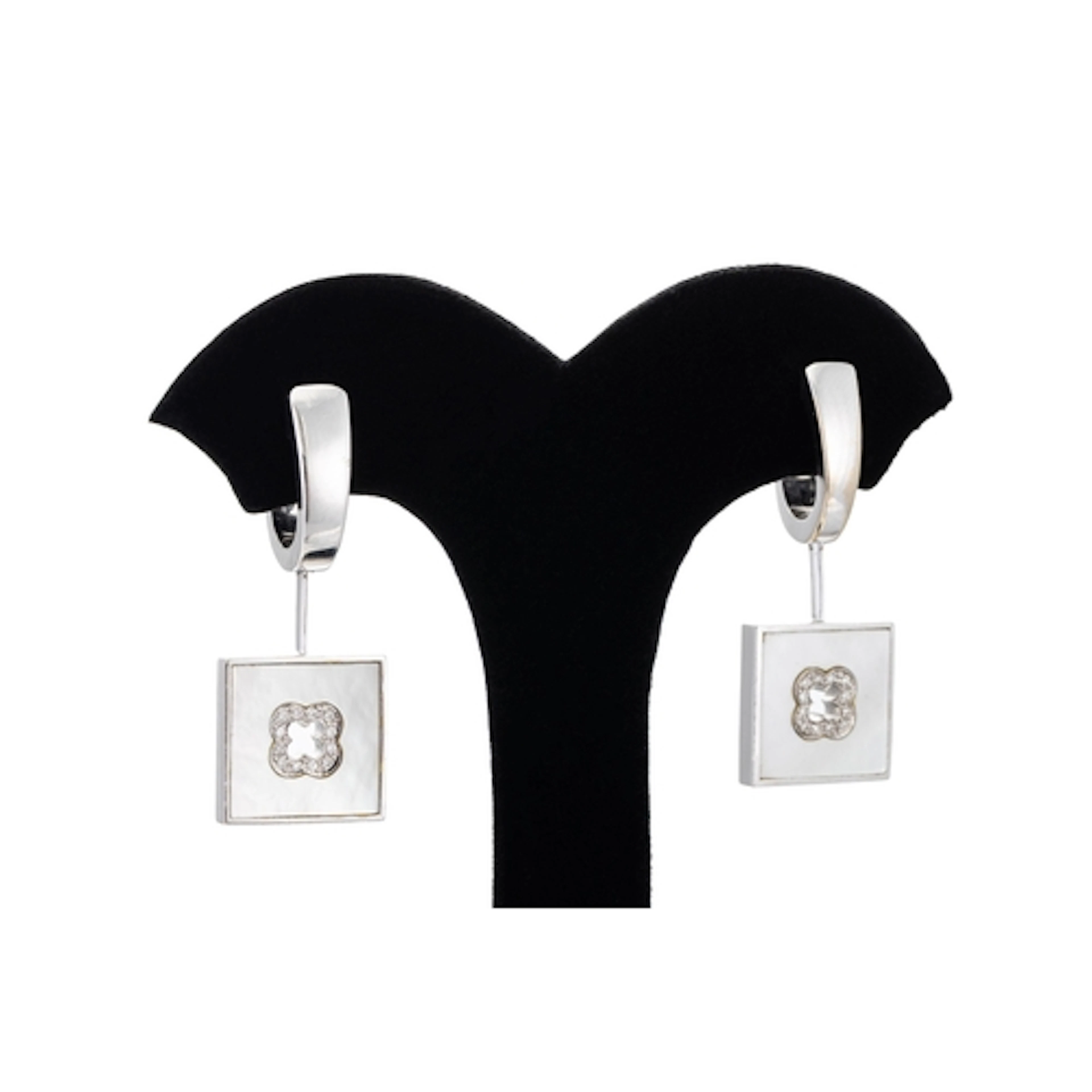 A PAIR OF MAUBOUSSIN MOTHER-OF-PEARL AND DIAMOND SQUARE EARR...