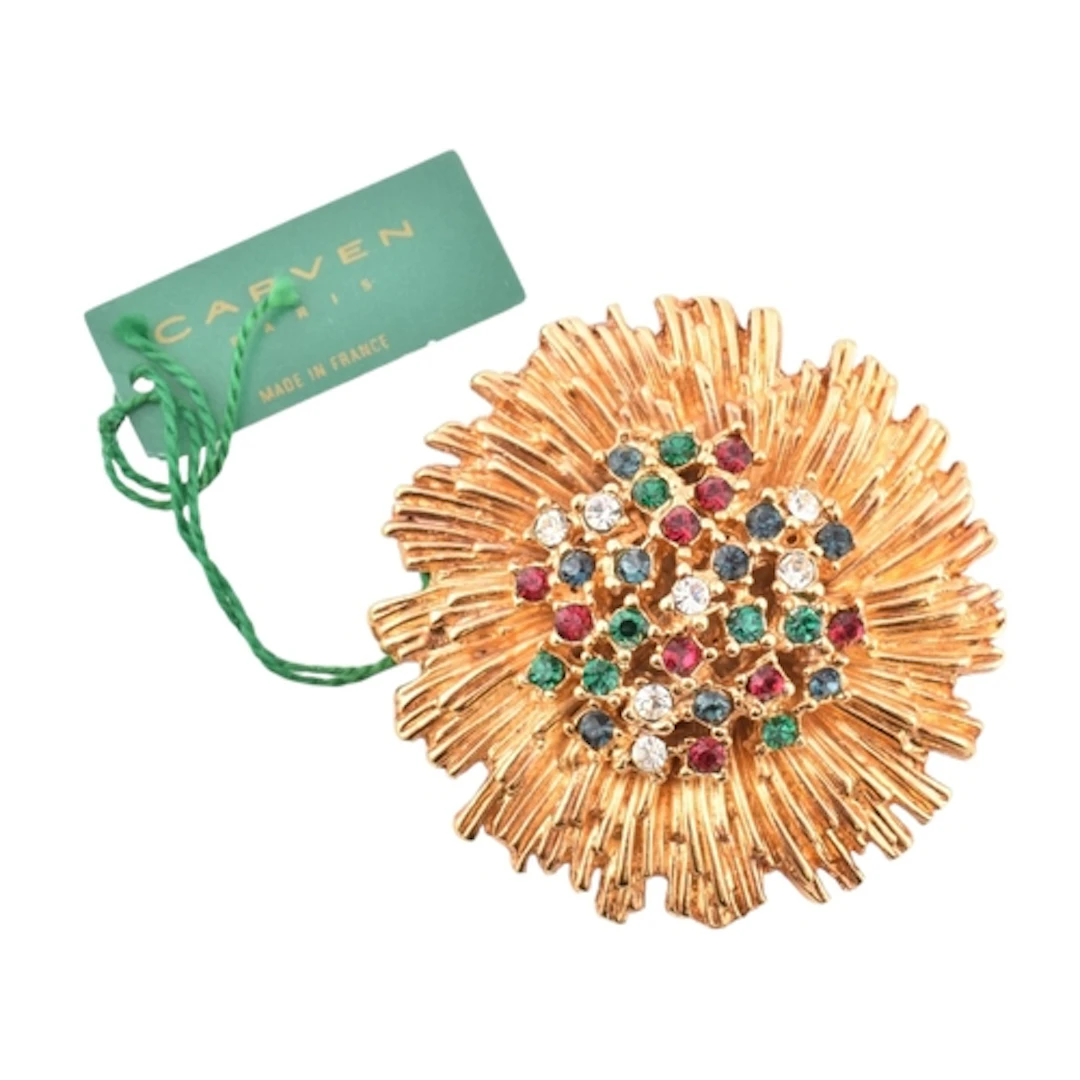 A 1960s French signed Carven Paris gold tone rhinestone broo...