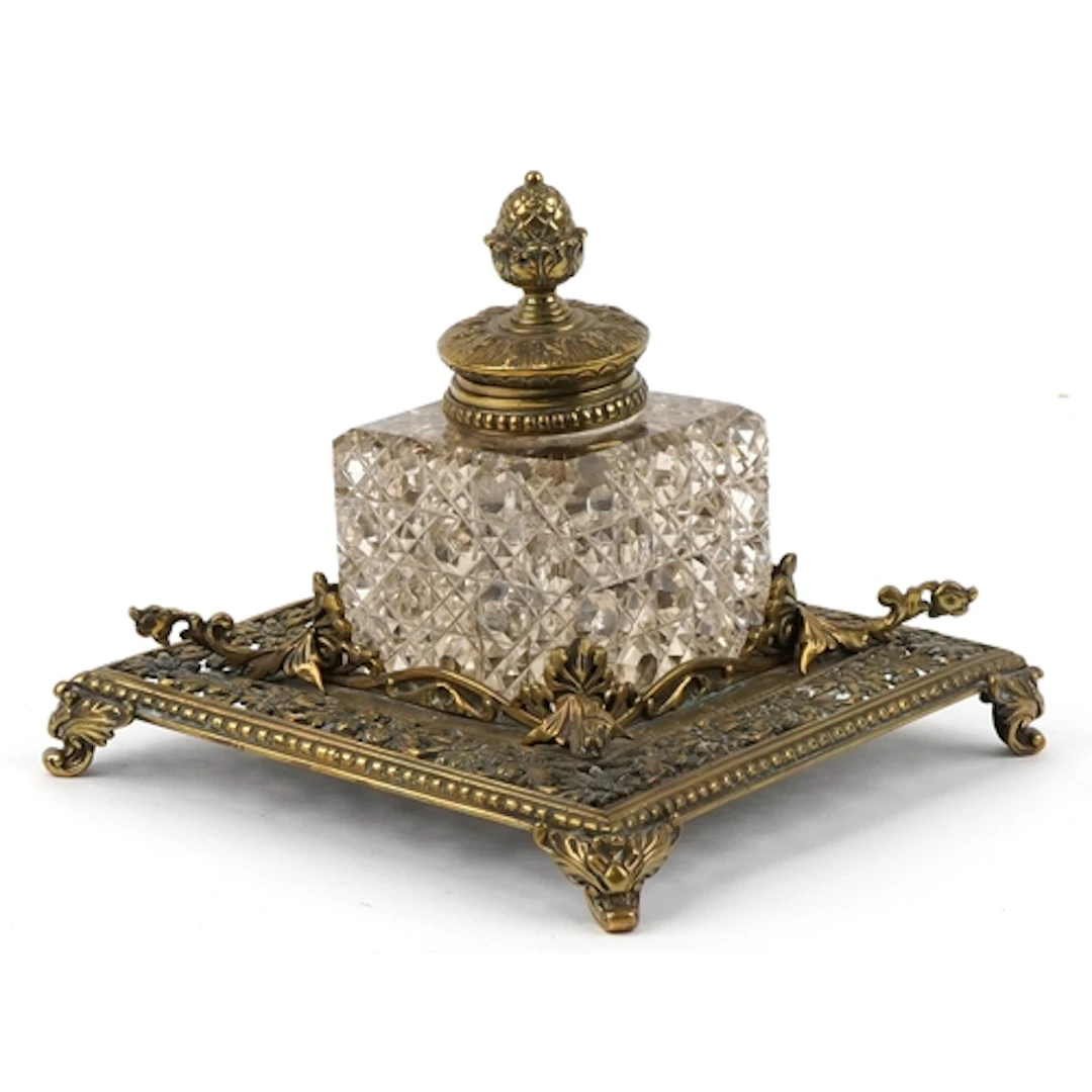 19th century square brass inkstand with a facetted cut glass...
