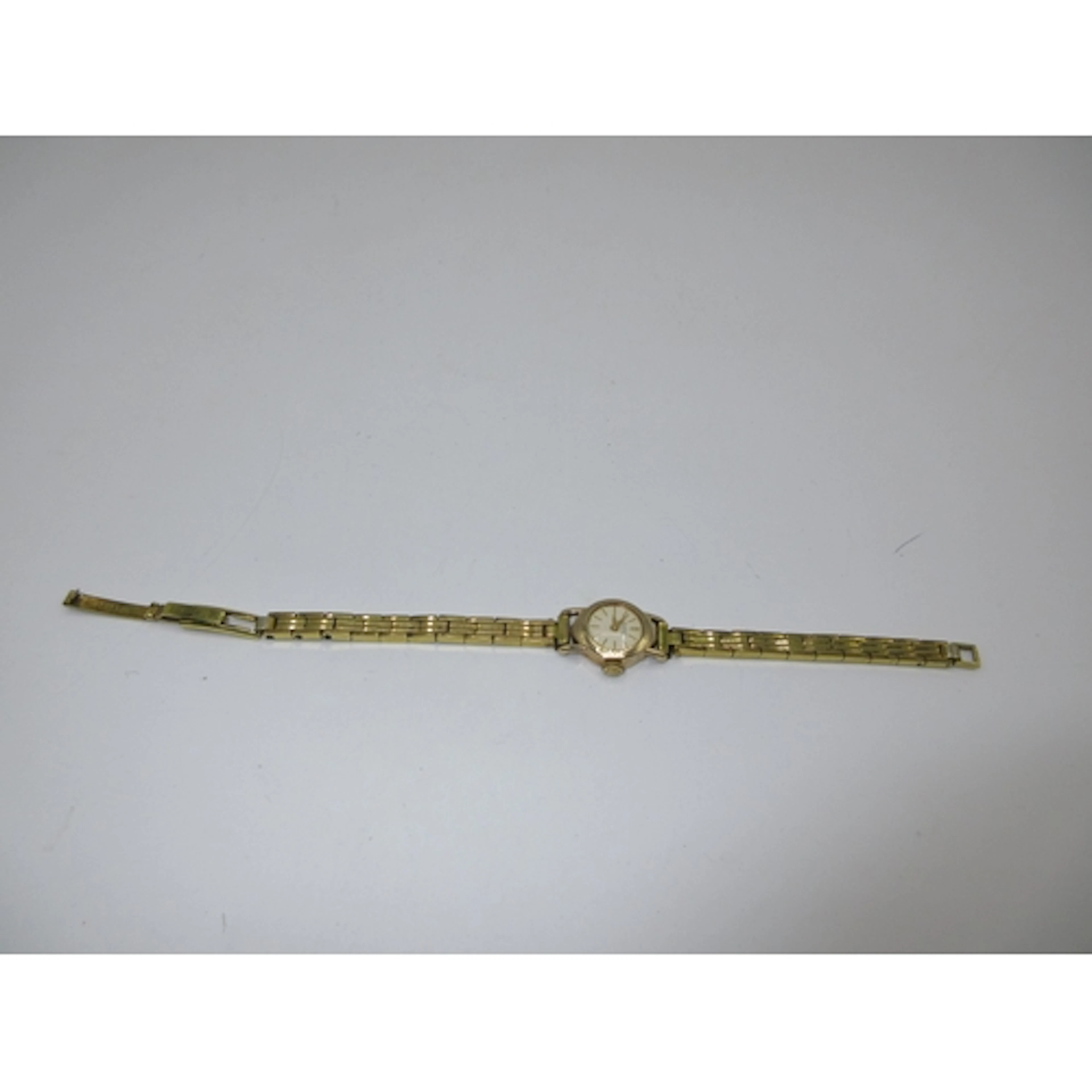 Ladies 9ct Gold Buren Watch on a Gold Plated Strap