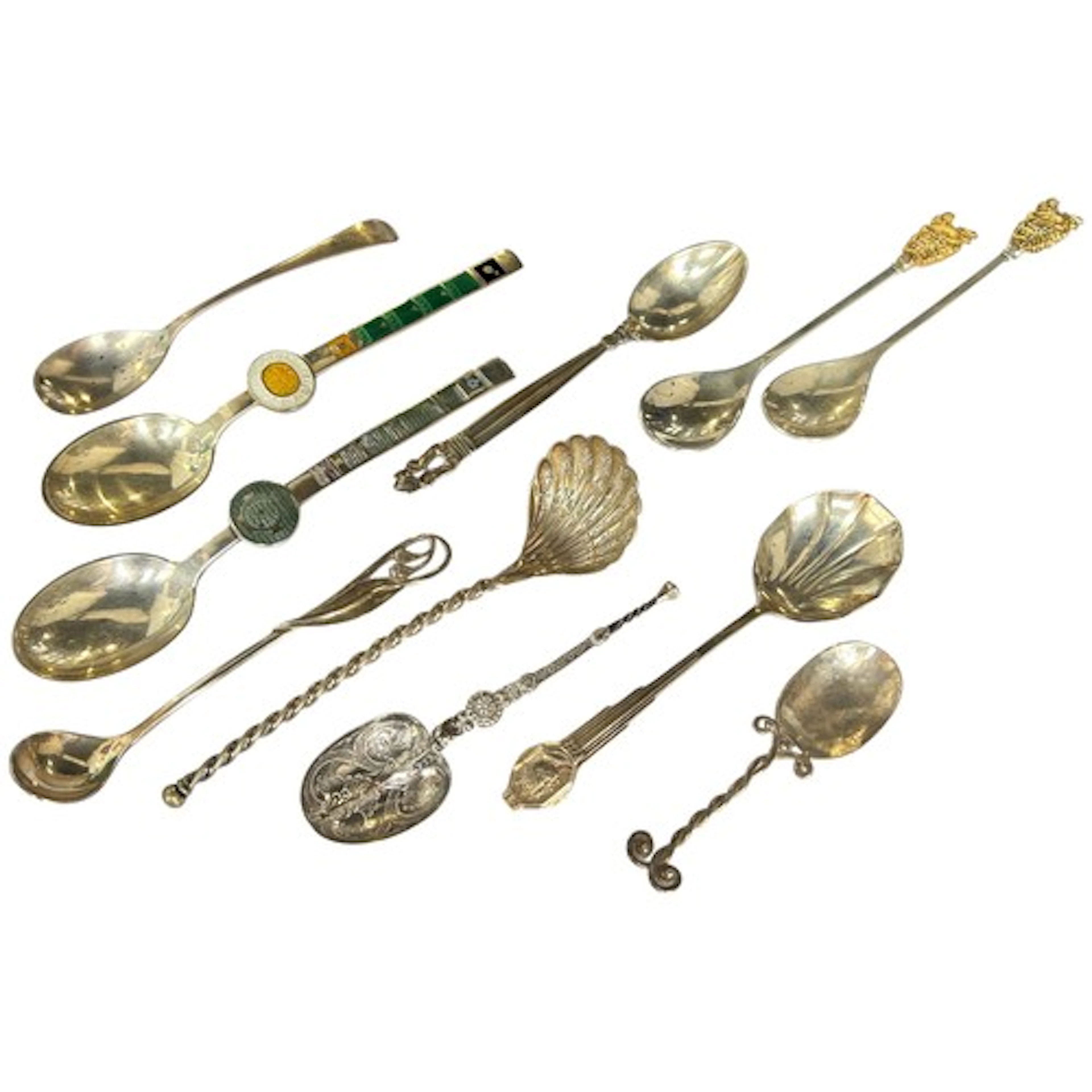 Mixed continental and British silver spoons to include A. Mi...