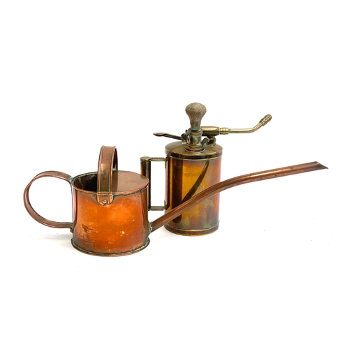 A very long spouted copper watering can 50cmL overall; toget...