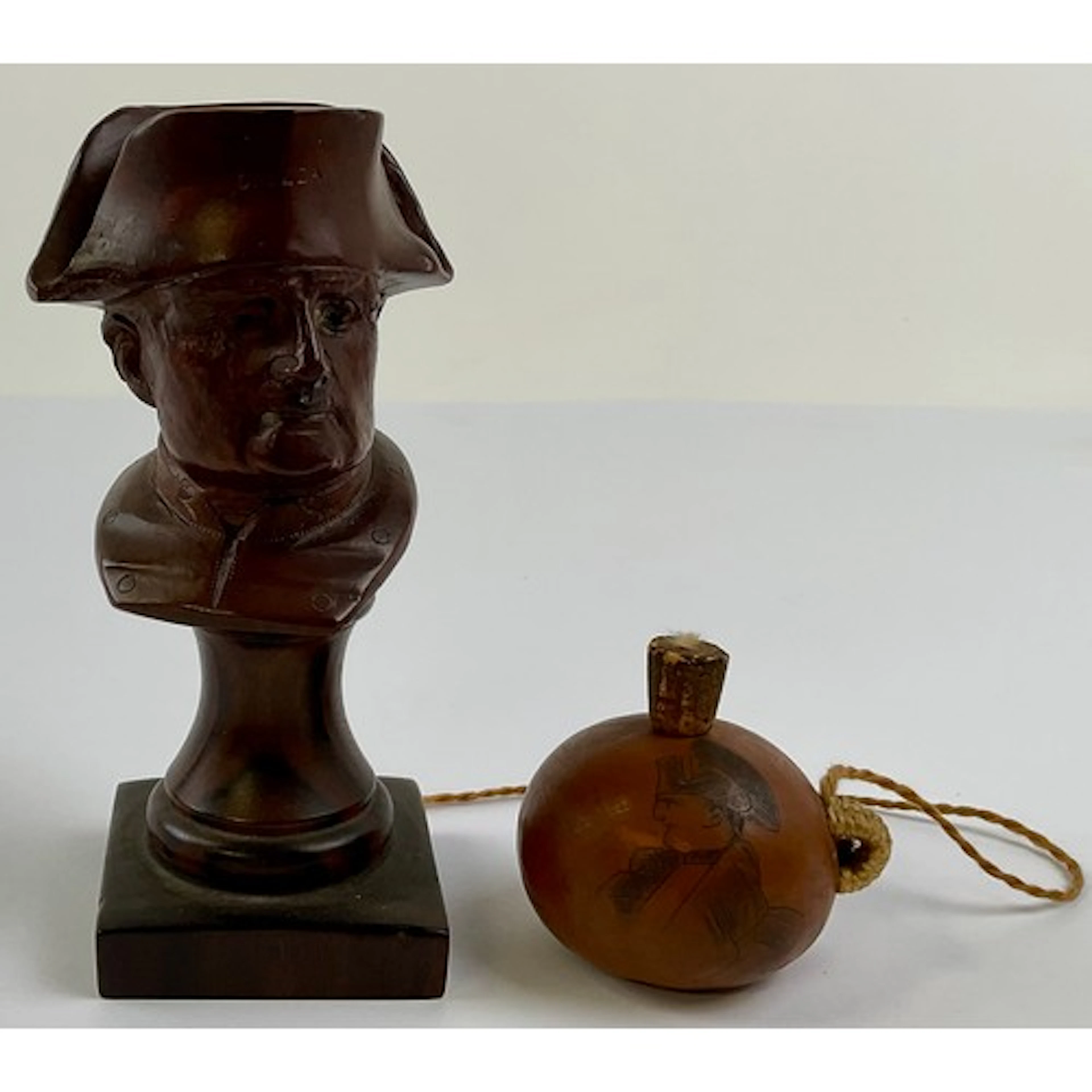 An early 20th century briar wood cabinet bust, carved as Nap...