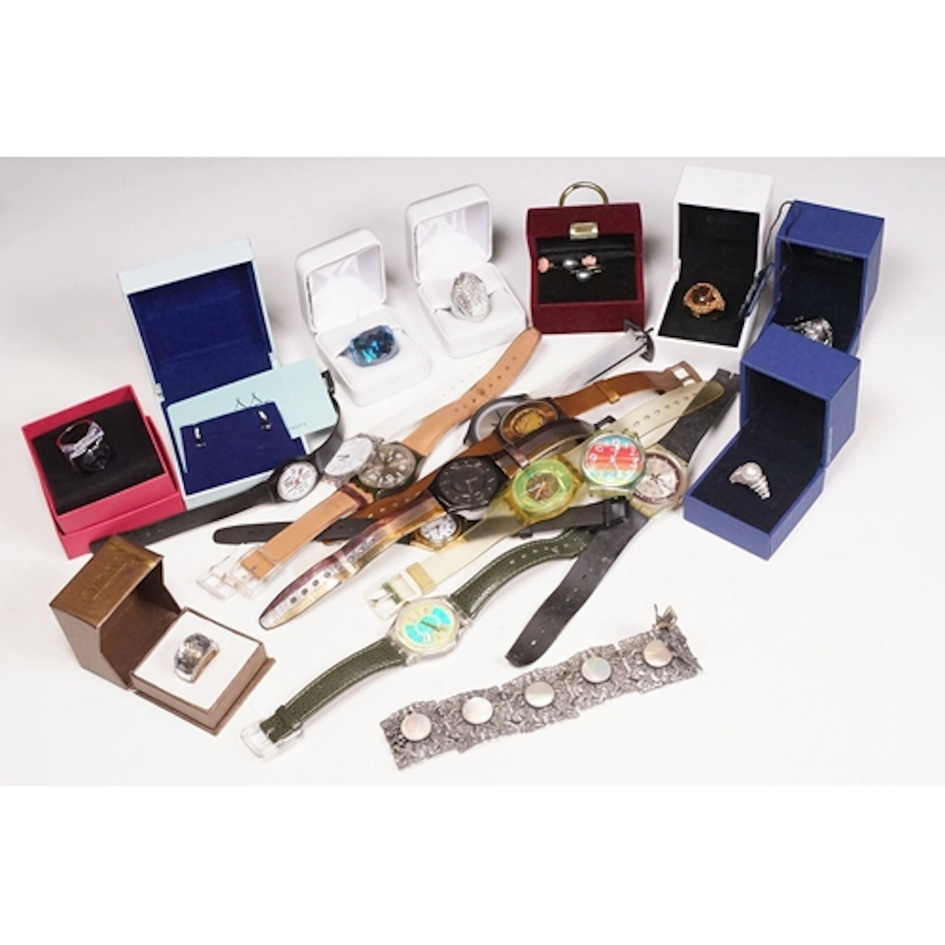 A collection of mixed costume jewellery to include cased Swa...