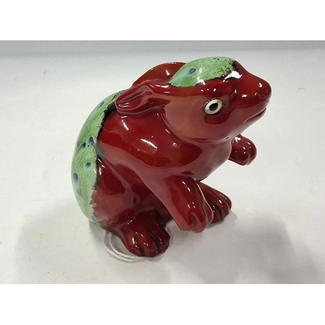 A BERNARD MOORE RABBIT FIGURE, the hollow figure of a seated...