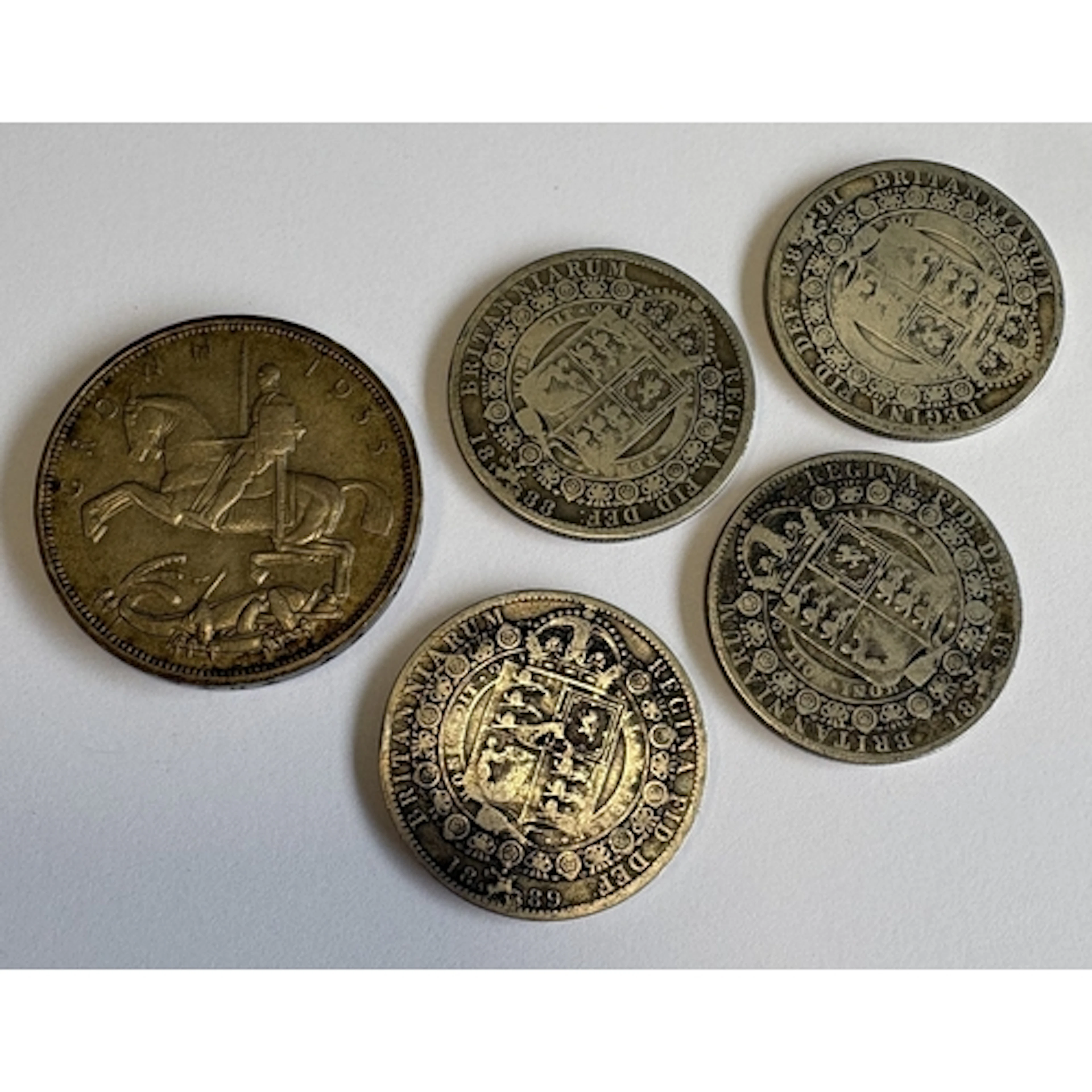 A silver Crown coin together with half Crown coins etc. Appr...
