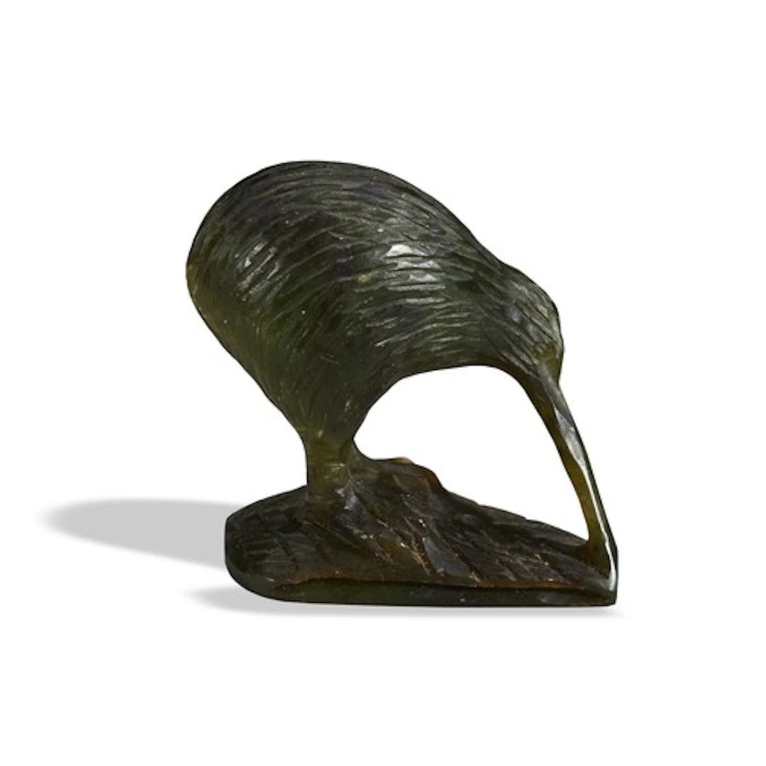 A GREEN HARDSTONE (KAWAKAWA) CARVING OF A KIWI BIRD FROM NEW...