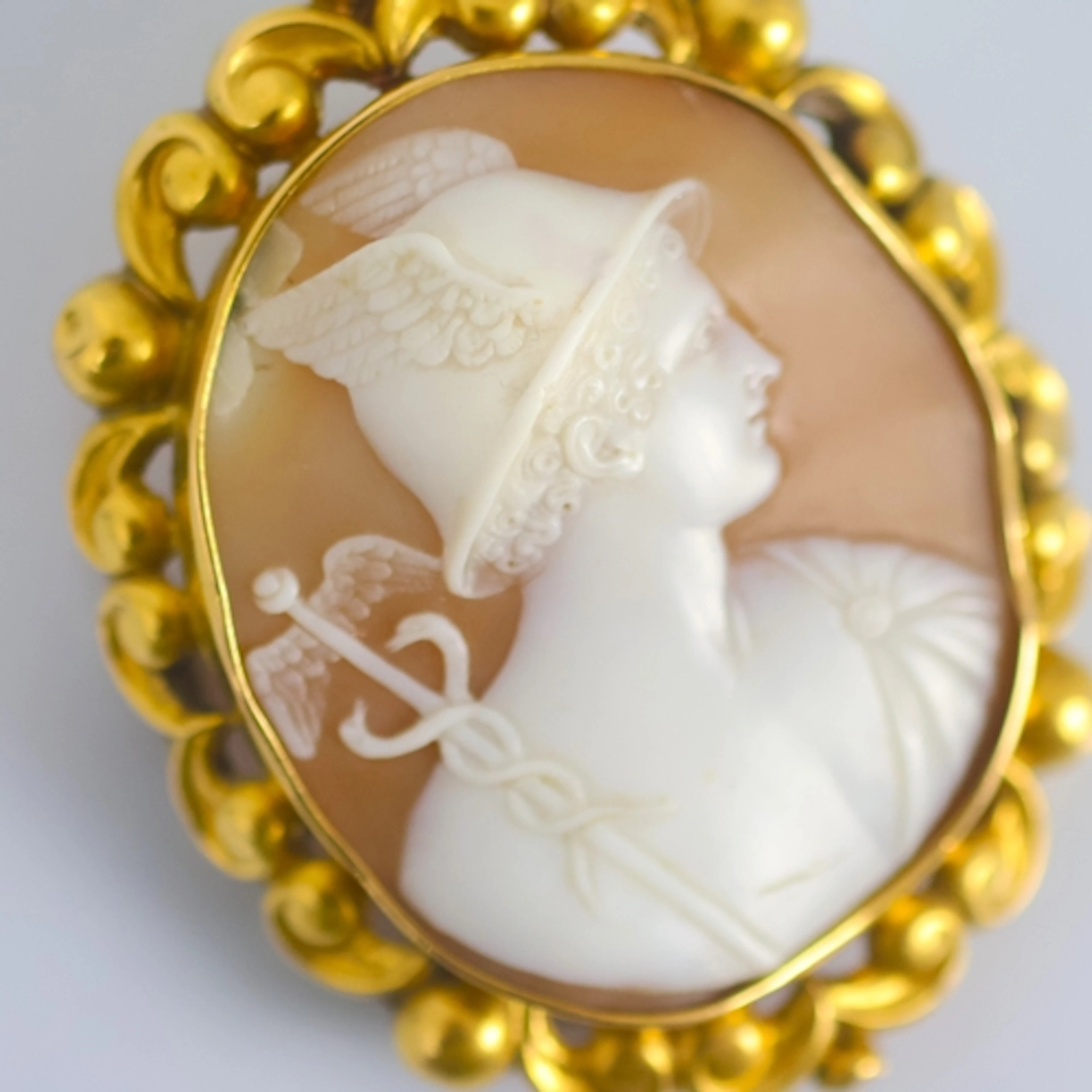 A 19th century cameo brooch, the oval cameo depicting Mercur...