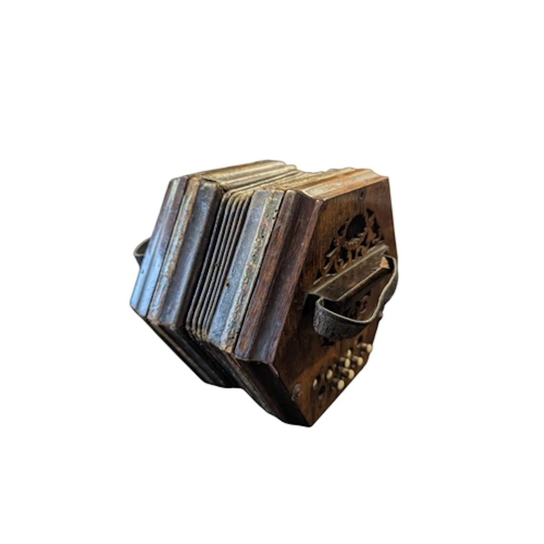 An early 20th century wooden squeezebox accordion. Having fl...