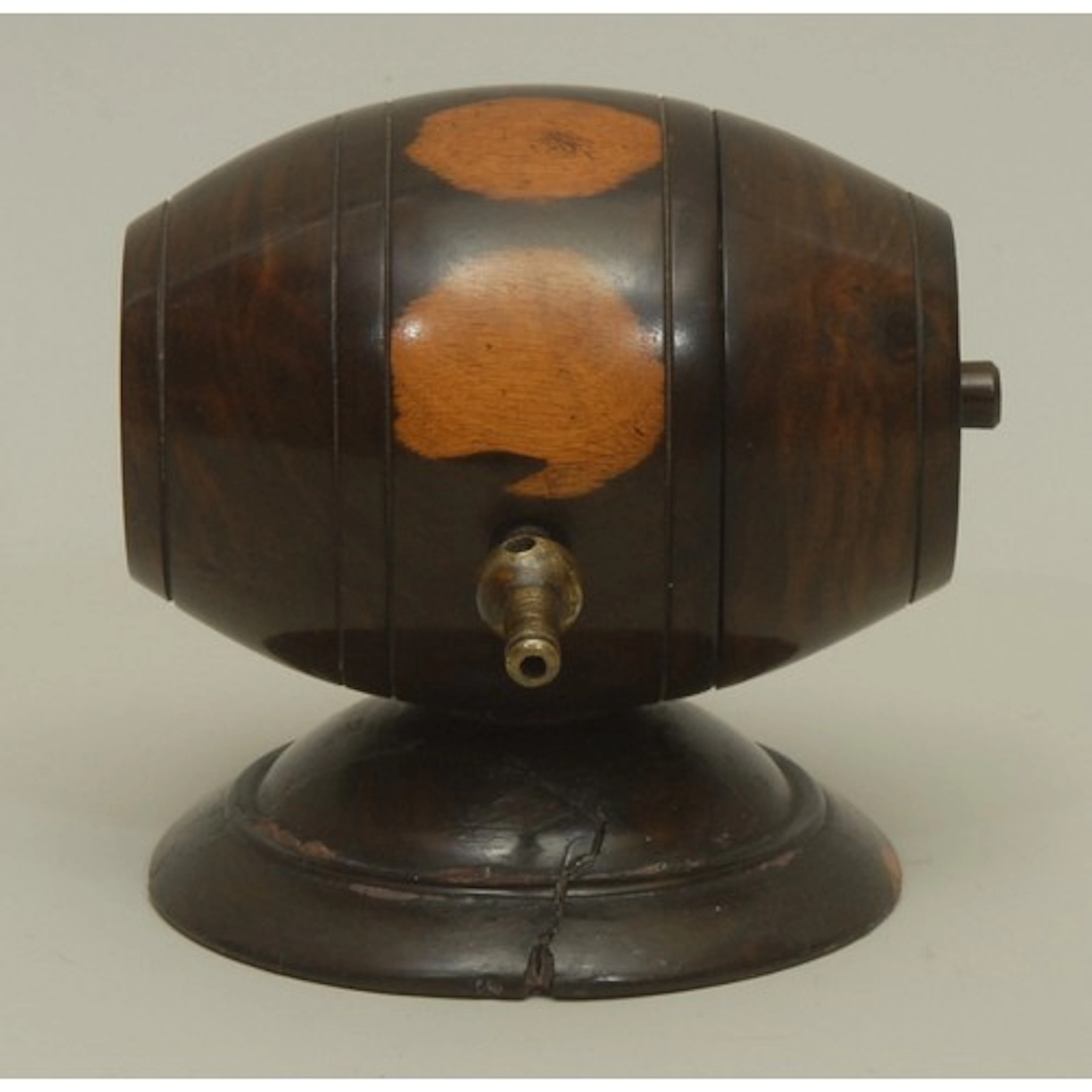 Treen - a 19th century lignum vitae and brass mounted string...