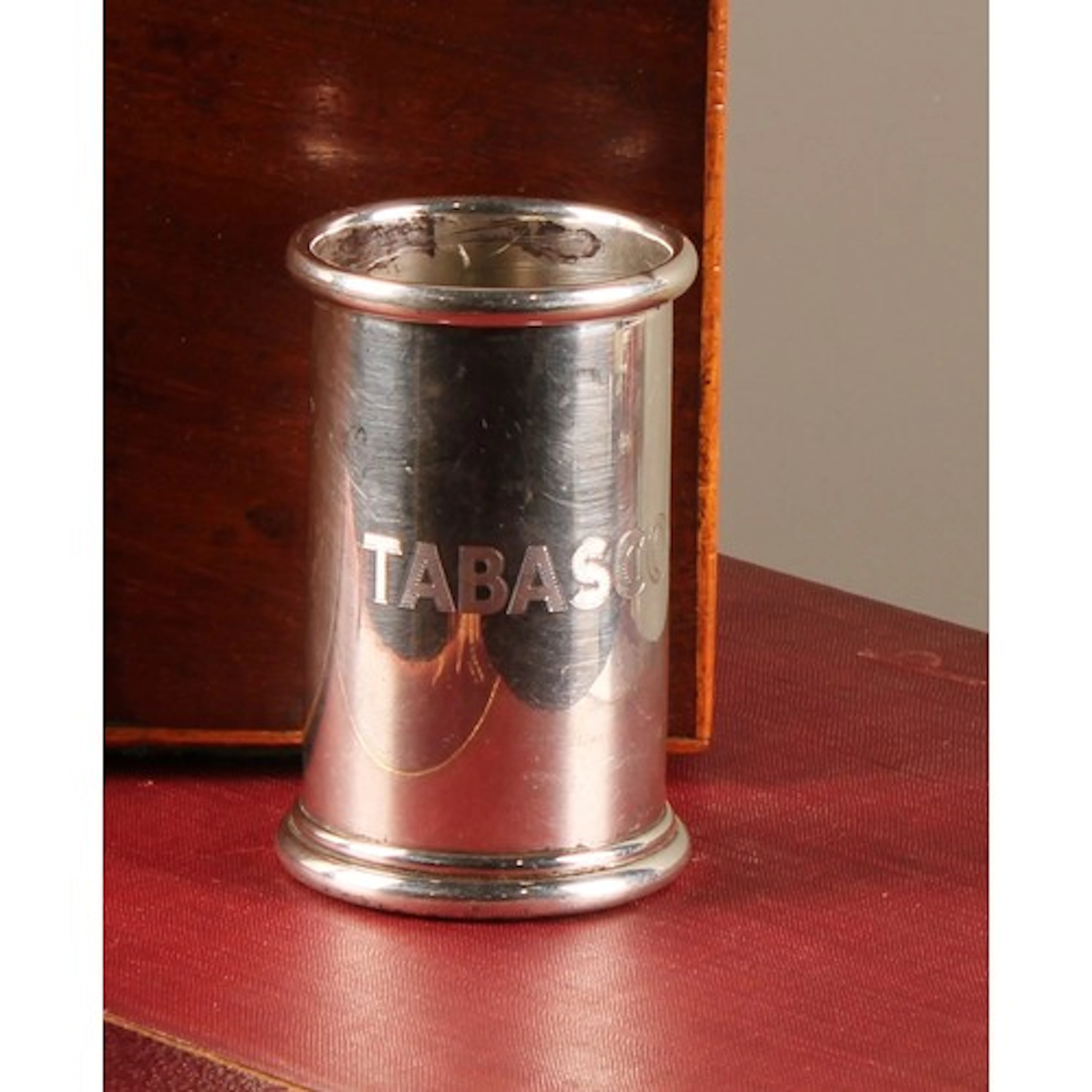 Theo Fennell - an Elizabeth II silver condiment stand, inscr...