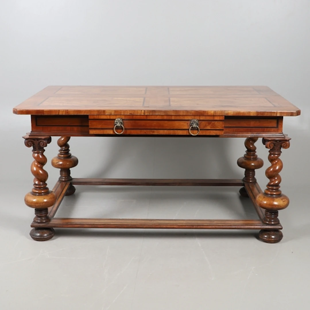 A 19TH CENTURY DUTCH WALNUT CENTRE TABLE. the quarter veneer...