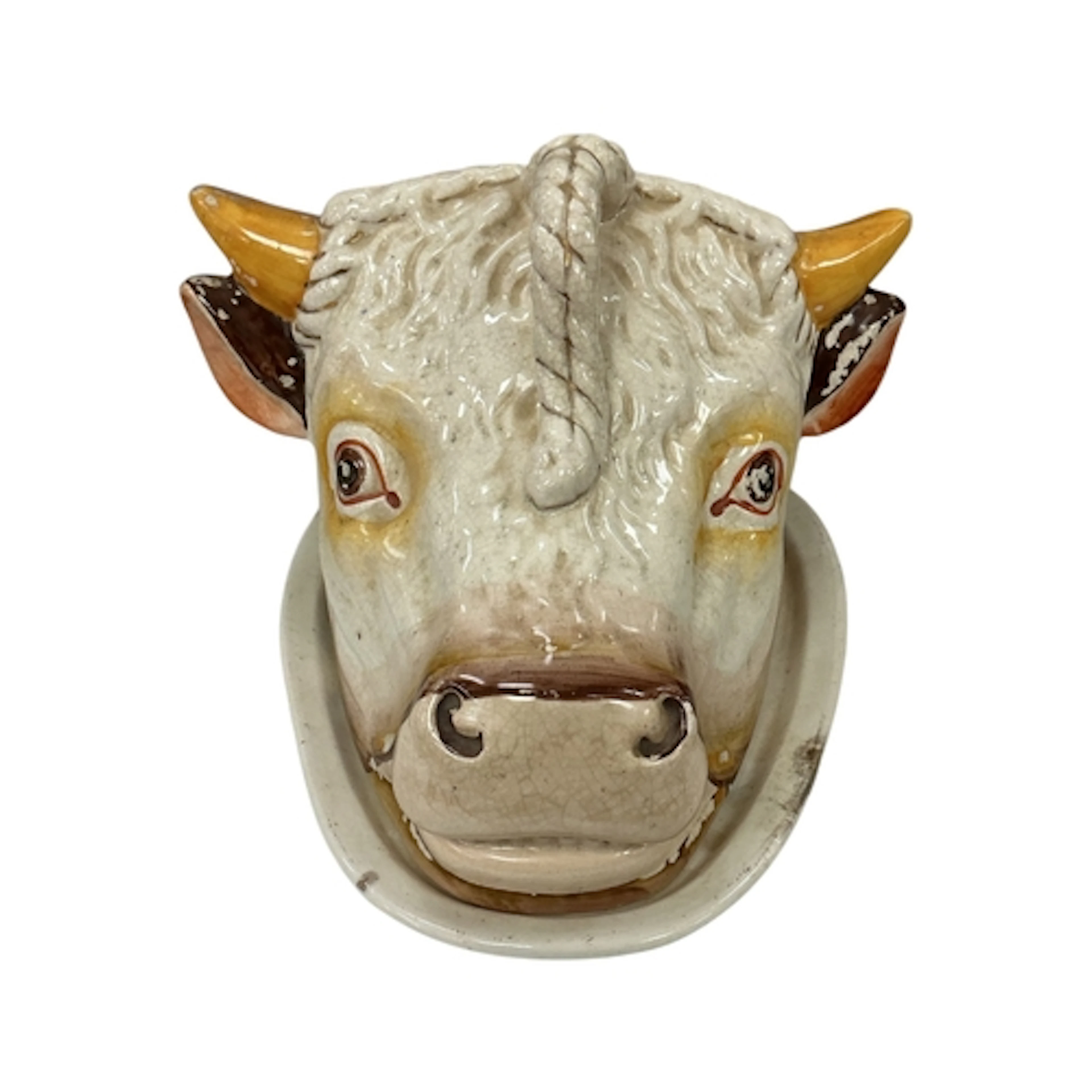A Victorian Staffordshire pottery cow head cheese dish and c...