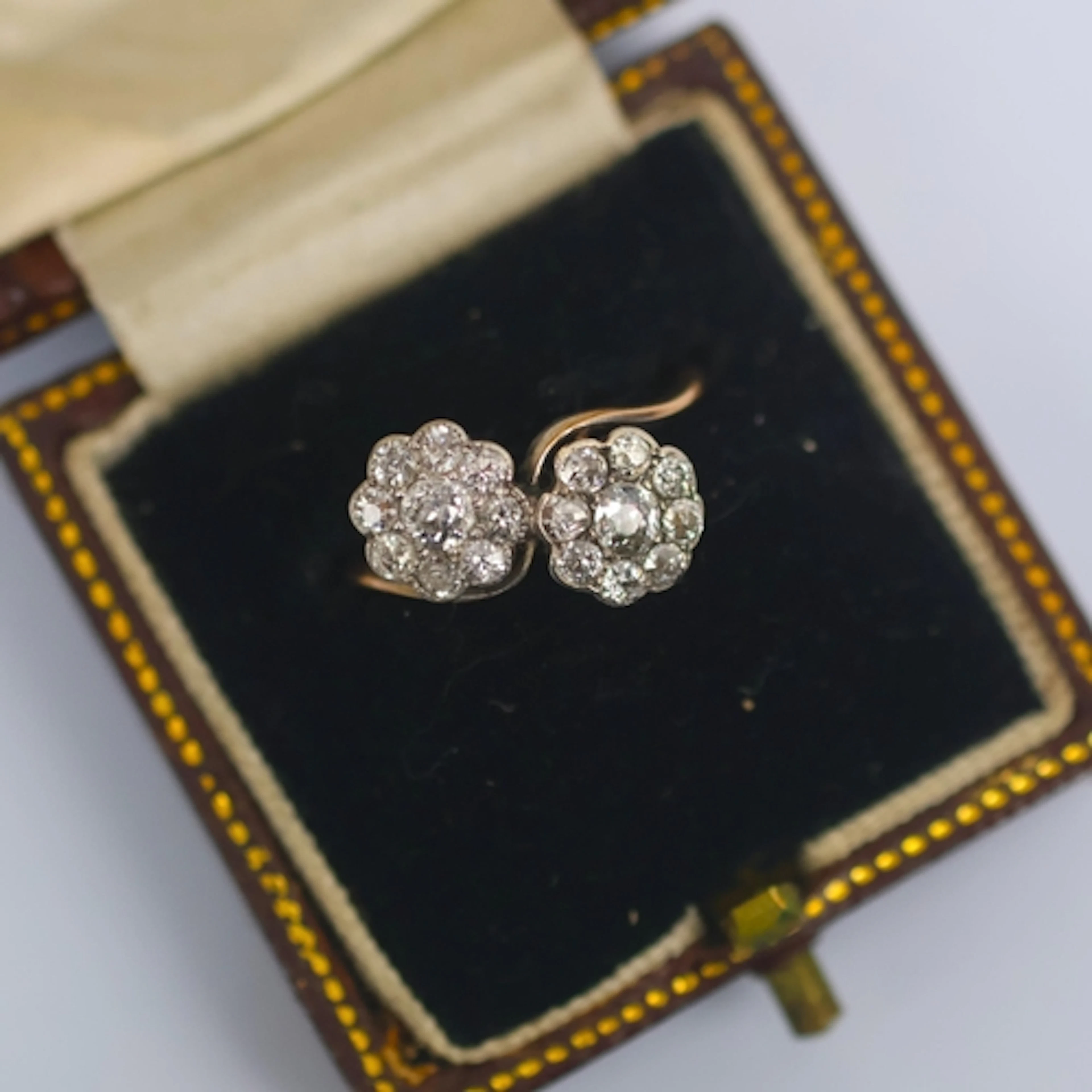 An early 20th double daisy cluster ring, the toi et moi styl...