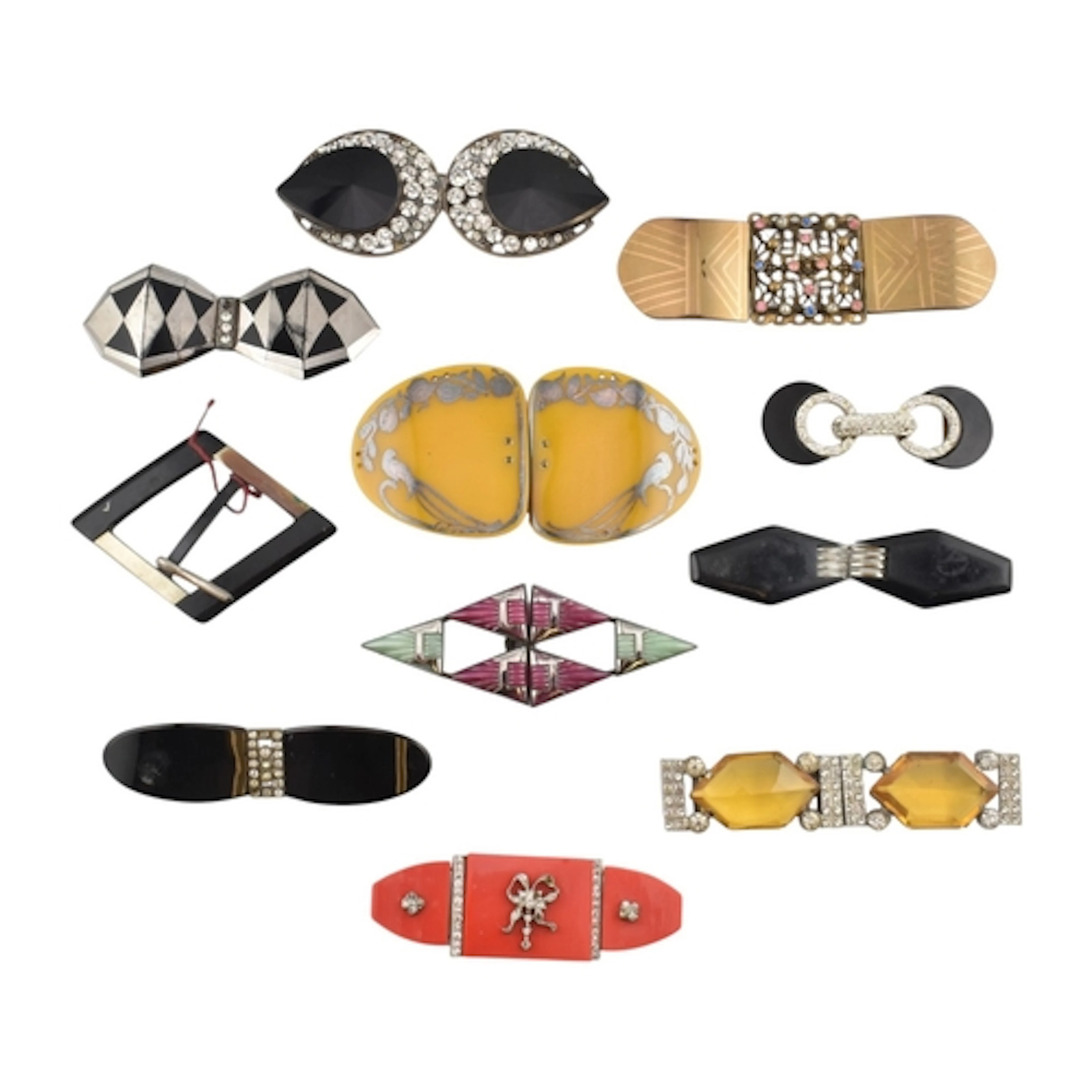 Art Deco enamel and rhinestone paste belt buckles. Eleven be...