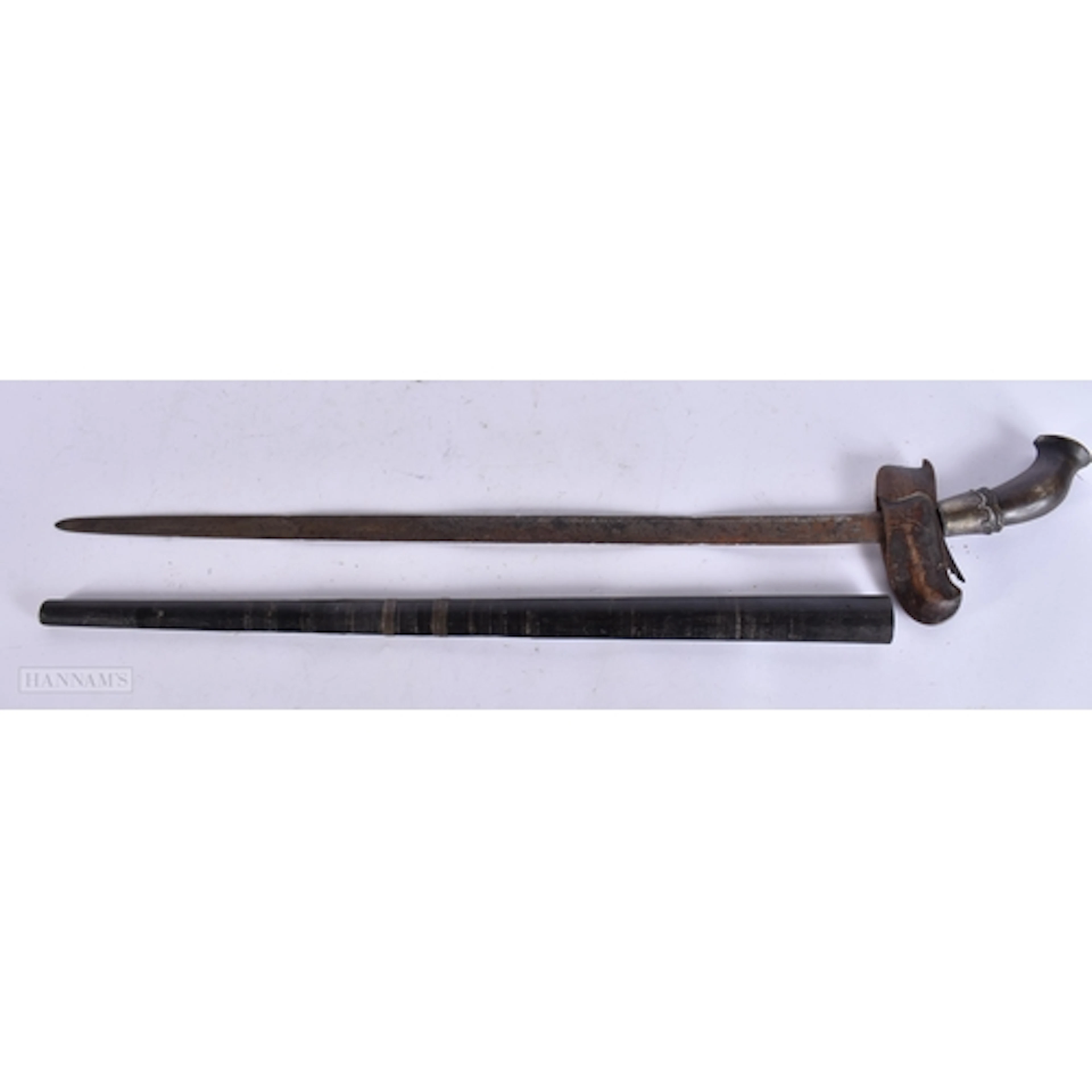 A 19TH CENTURY MIDDLE EASTERN ISLAMIC RHINOCEROS HORN HANDLE...