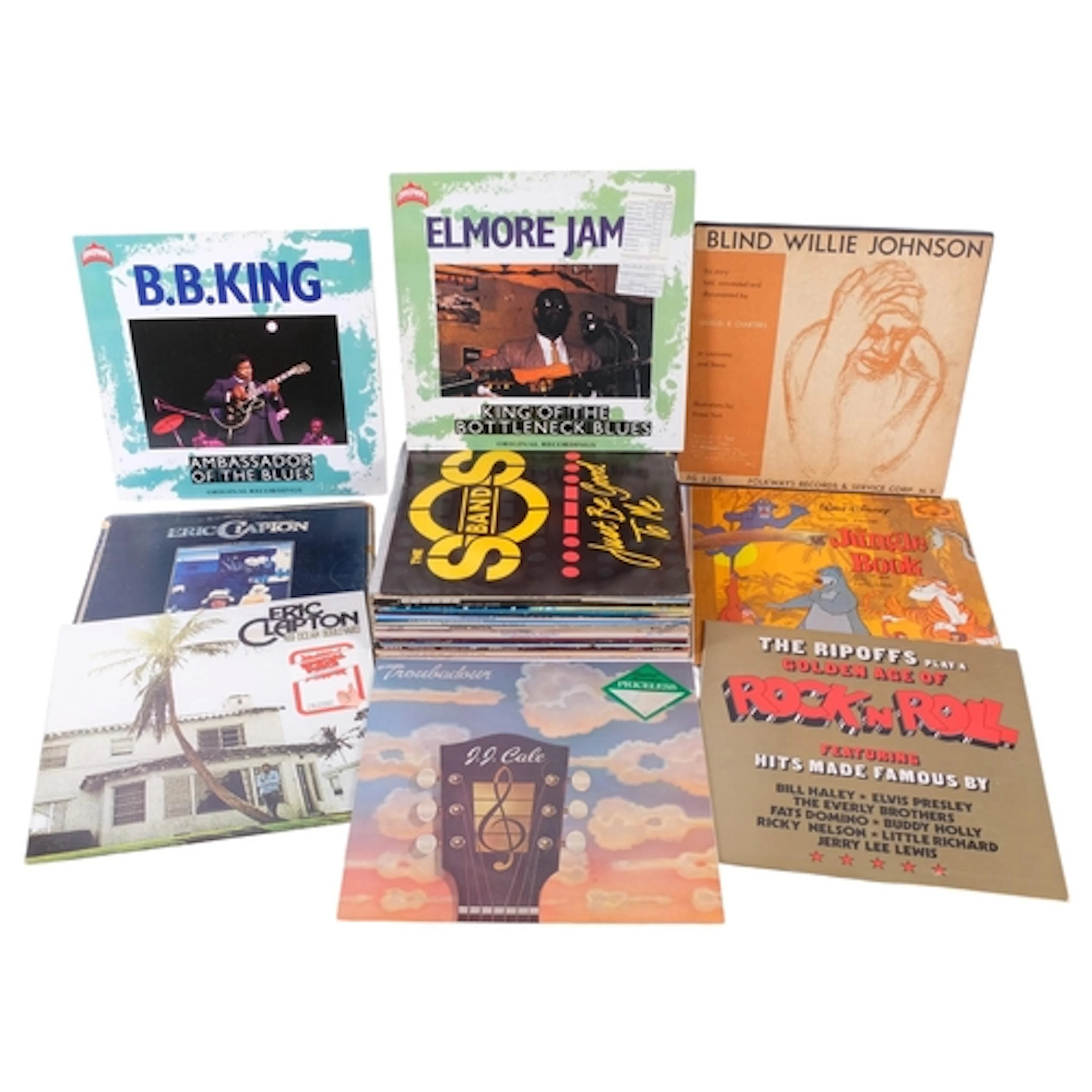 A collection of various LPs, including Eric Clapton, Elmore ...