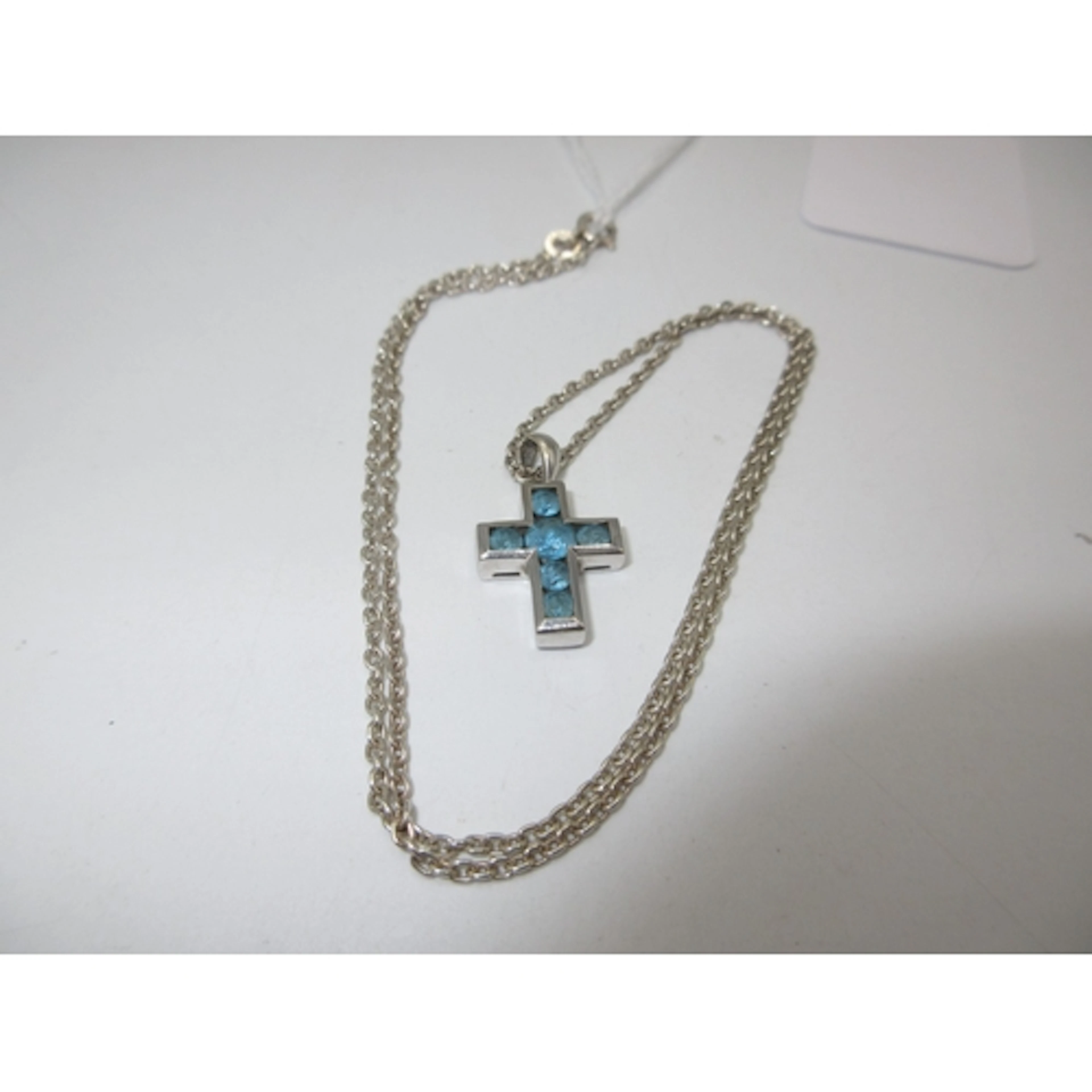 9ct Gold and Blue Stone Set Cross Pendant with a Silver Chai...