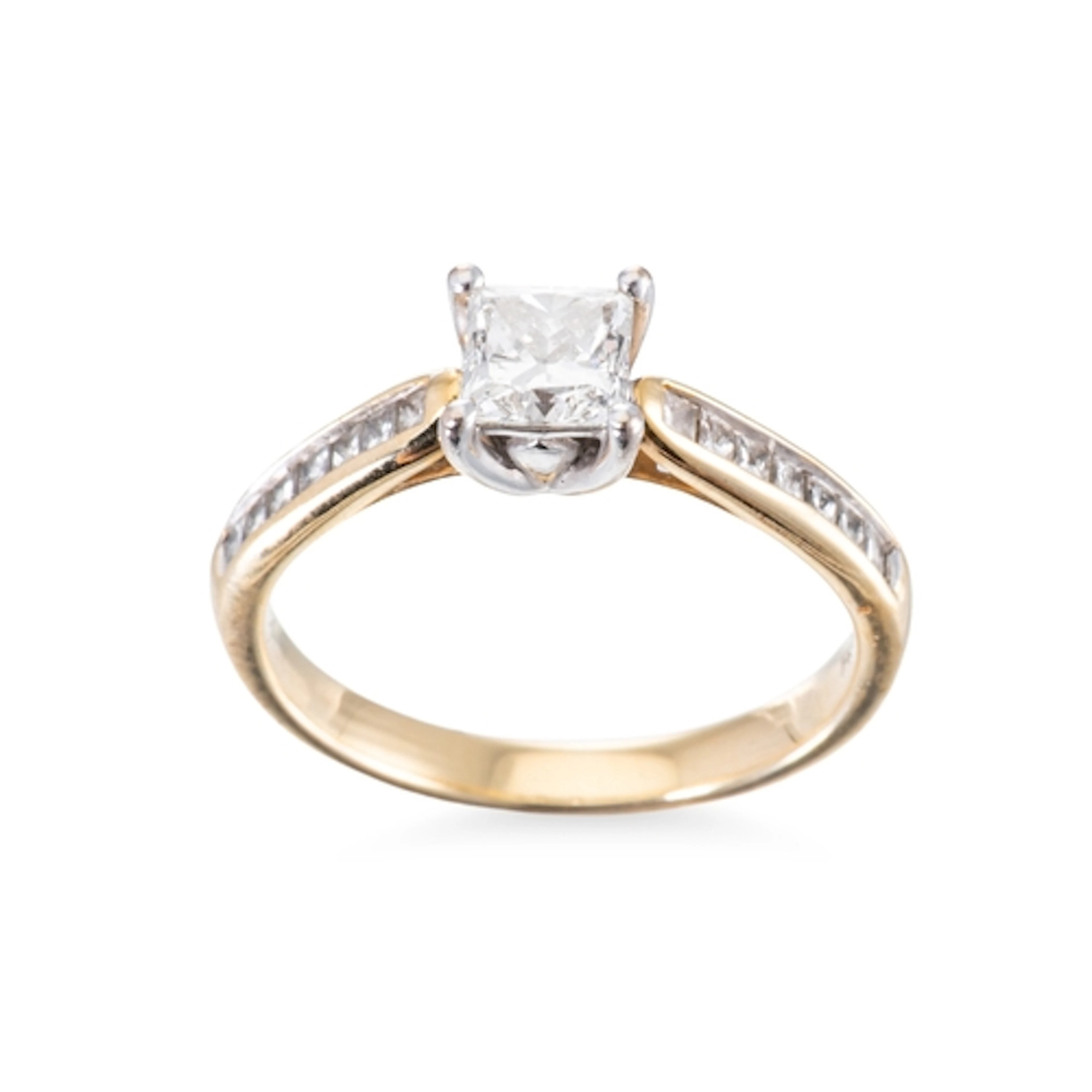 A DIAMOND SOLITAIRE RING, mounted in 18ct yellow gold to dia...