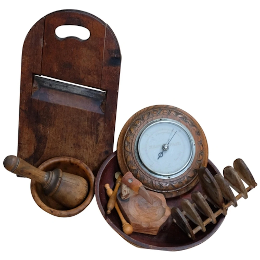 A turned wood pestle and mortar, a toast rack, barometer, sl...