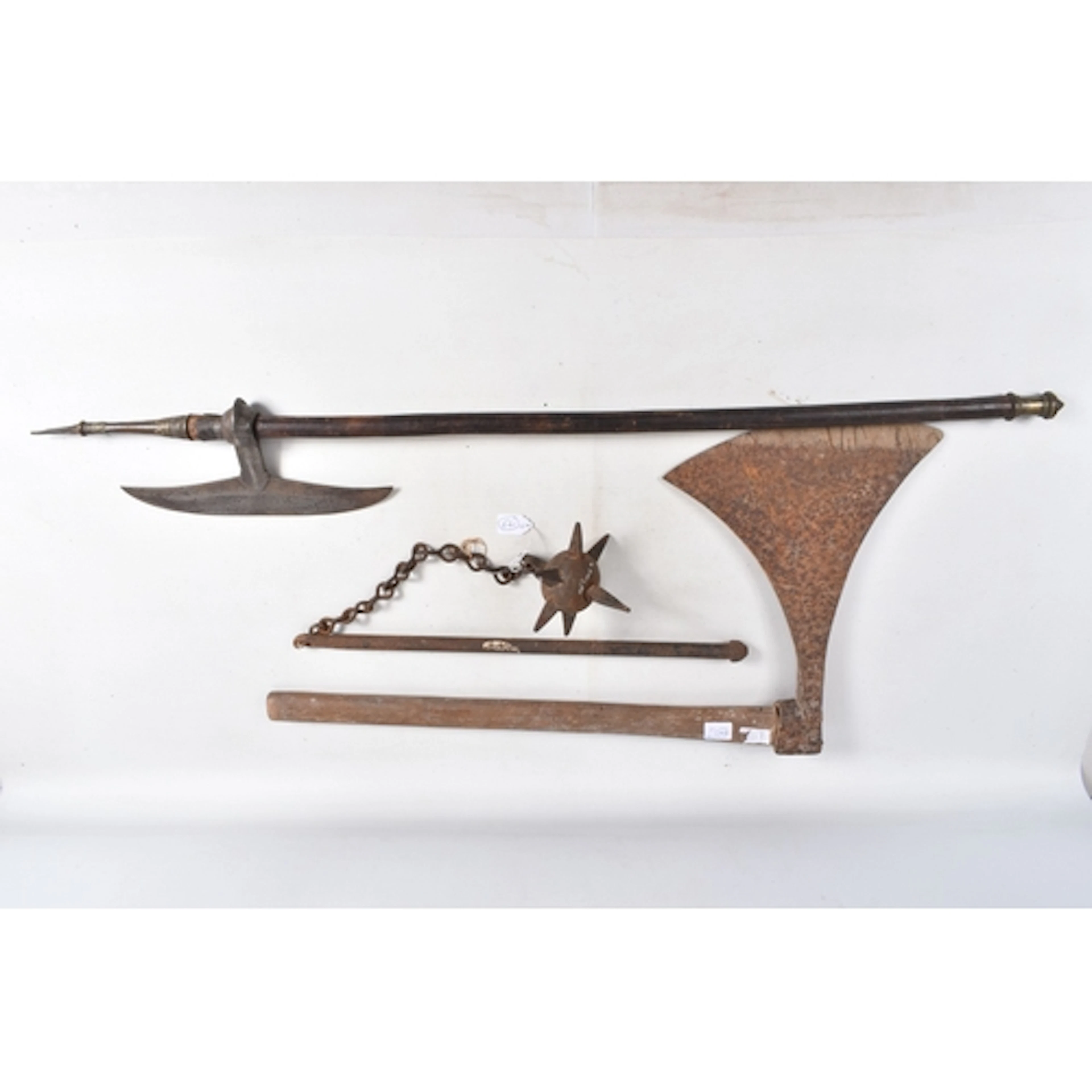 THREE MEDIEVAL STYLE WEAPONS, to include a flail, battle axe...