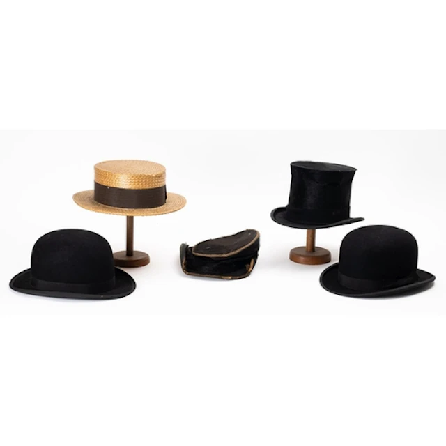 Two black felt top hats in brown leather hat boxes (54cm and...